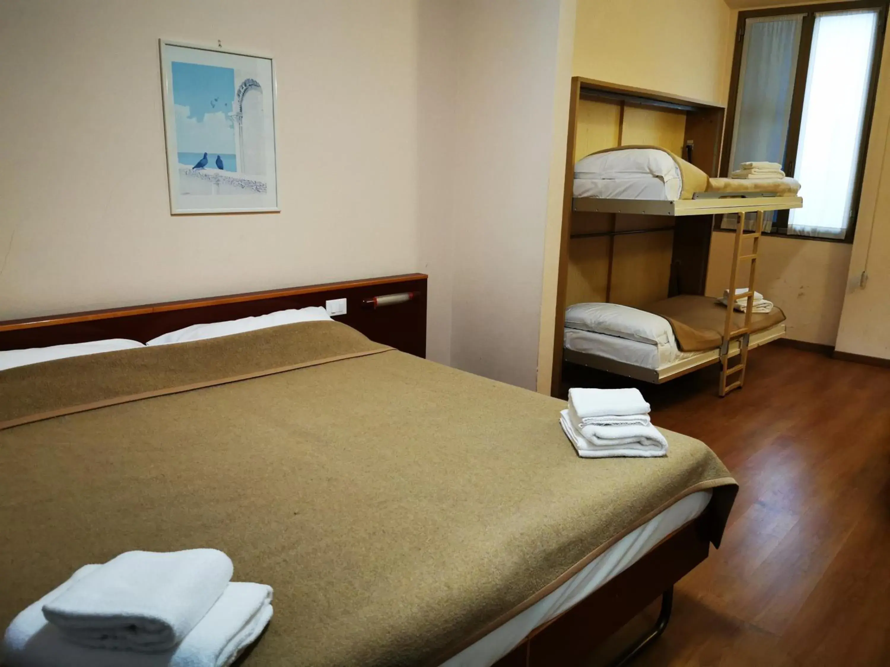 Bed in New Alexander Hotel Bed in New Alexander Hotel