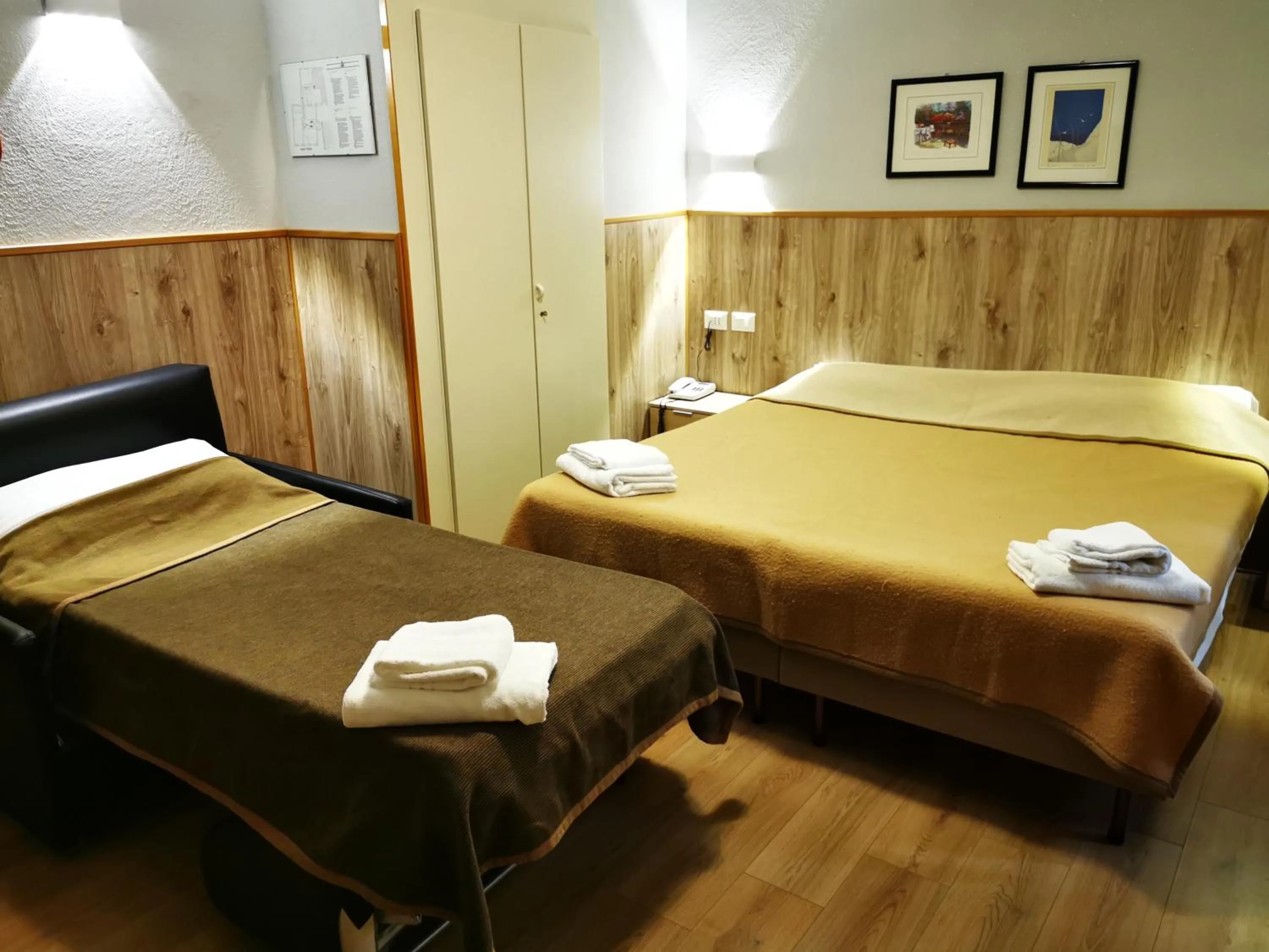 Bed in New Alexander Hotel