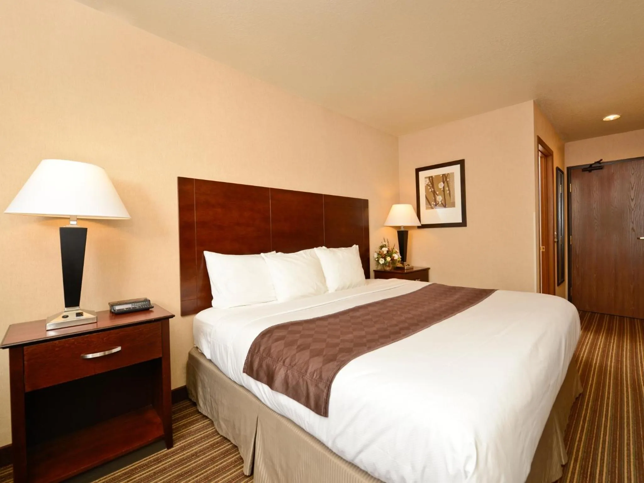 Bed in Yellowstone West Gate Hotel