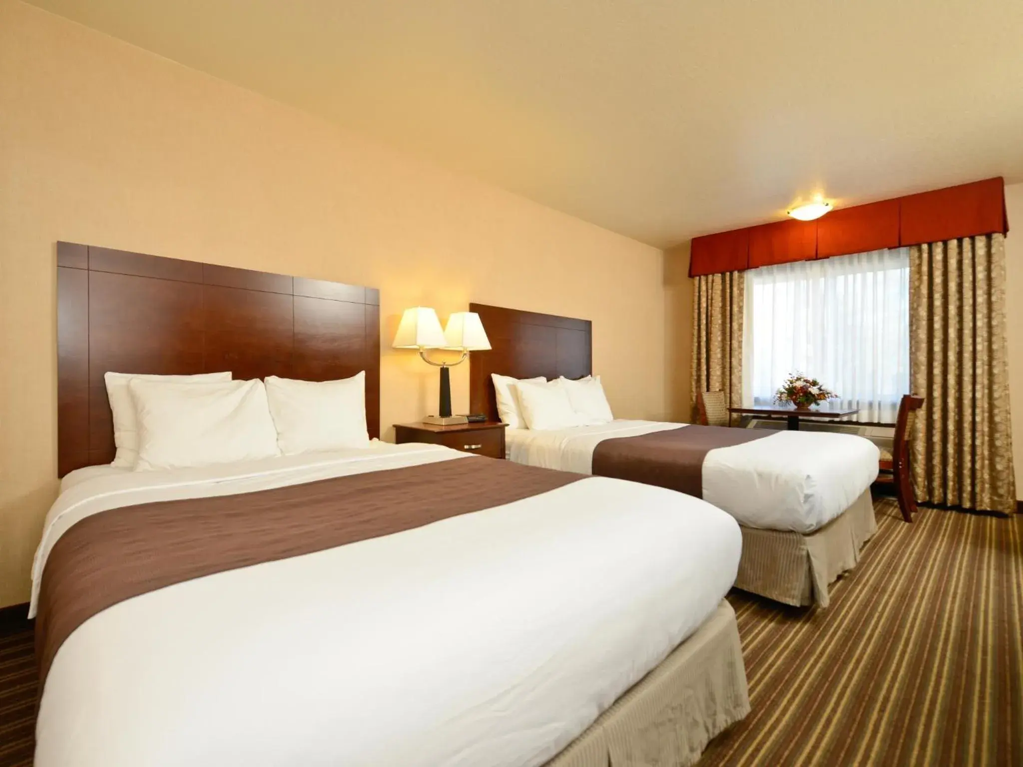 Bed in Yellowstone West Gate Hotel Bed in Yellowstone West Gate Hotel