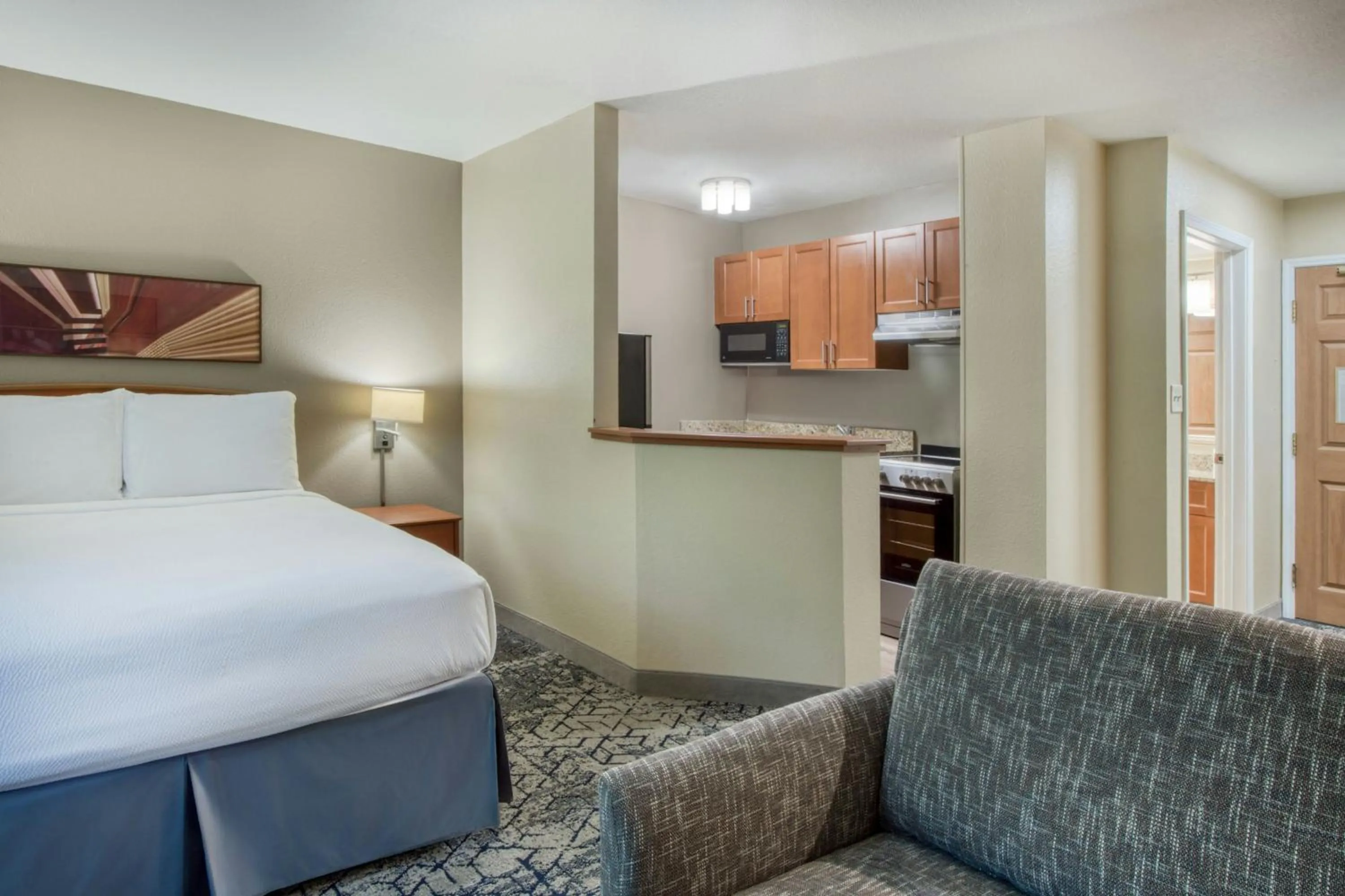 Kitchen or kitchenette, Bed in TownePlace Suites Raleigh Cary/Weston Parkway