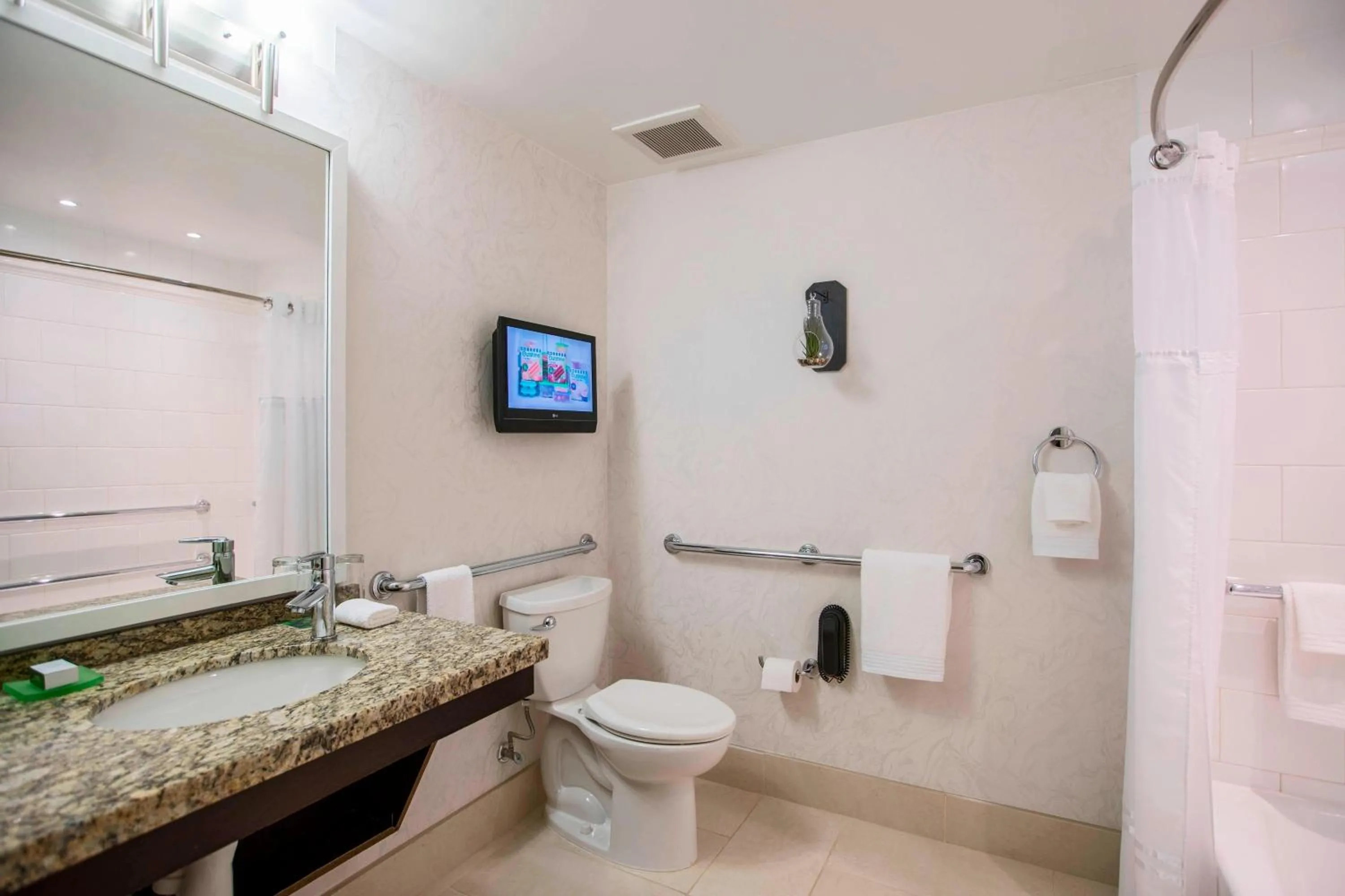 Bathroom in Renaissance Raleigh North Hills Hotel