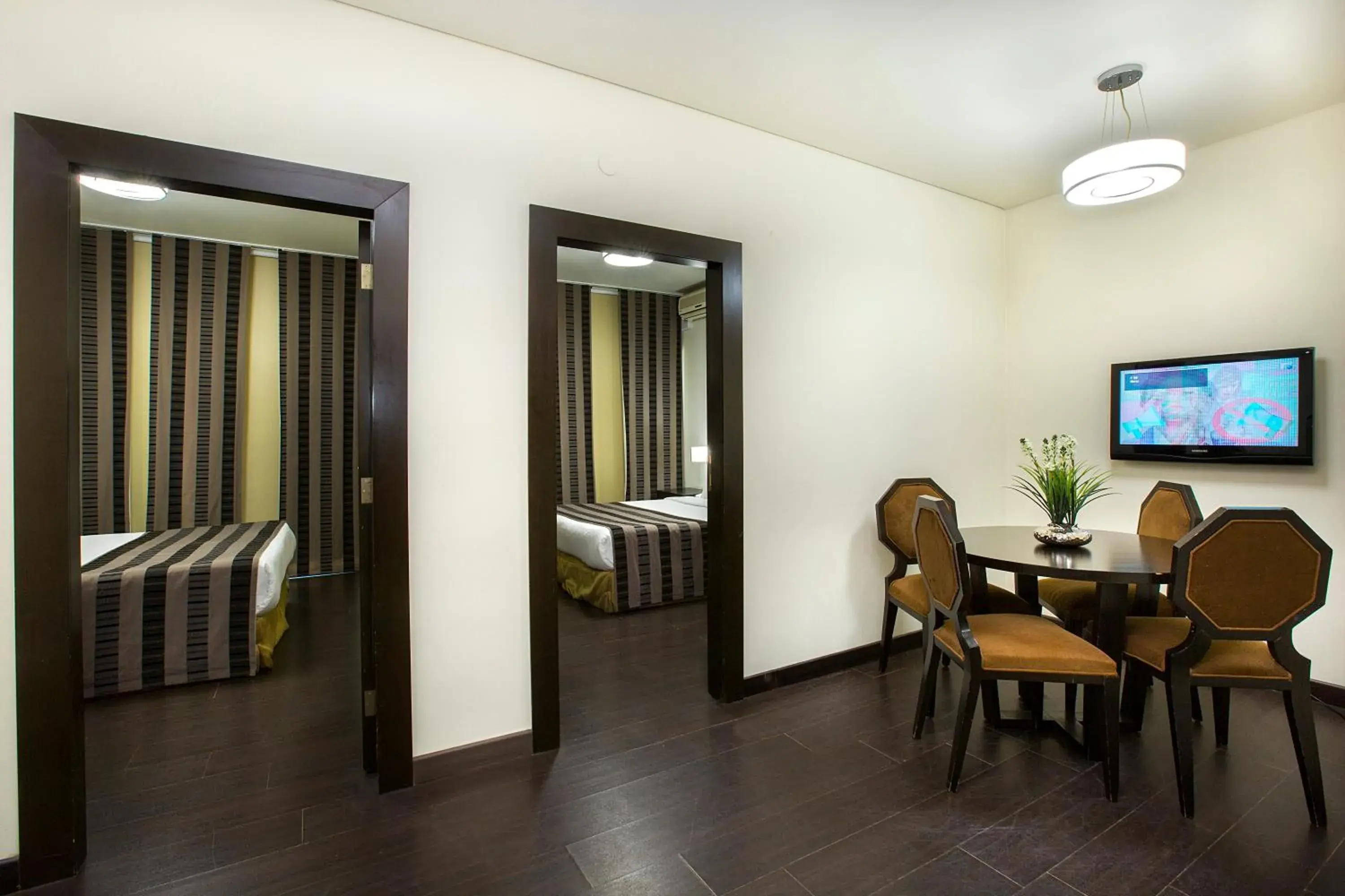 Communal lounge/ TV room, Bed in Orient Queen Homes Hotel Communal lounge/ TV room, Bed in Orient Queen Homes Hotel