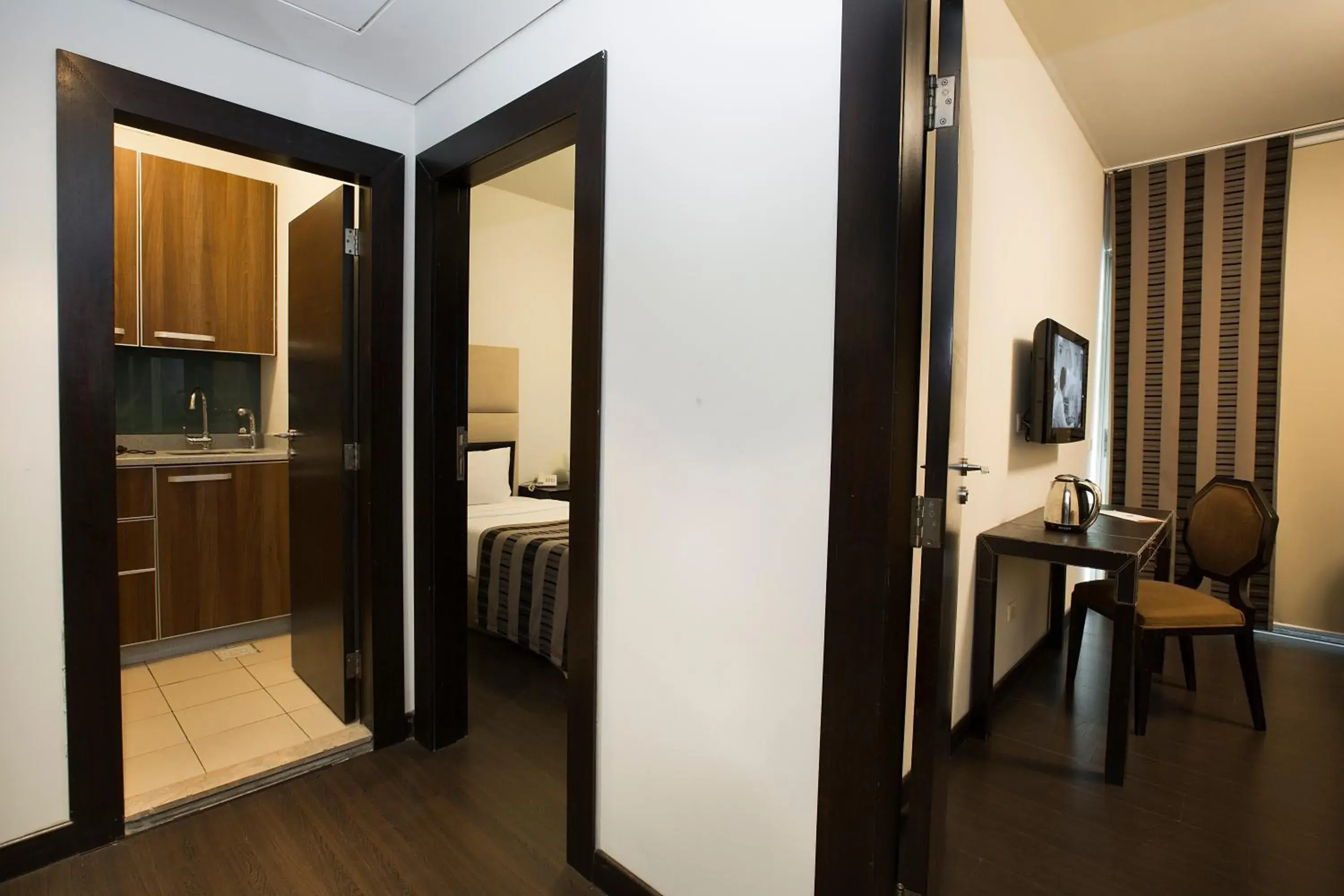 TV and multimedia, Bed in Orient Queen Homes Hotel TV and multimedia, Bed in Orient Queen Homes Hotel