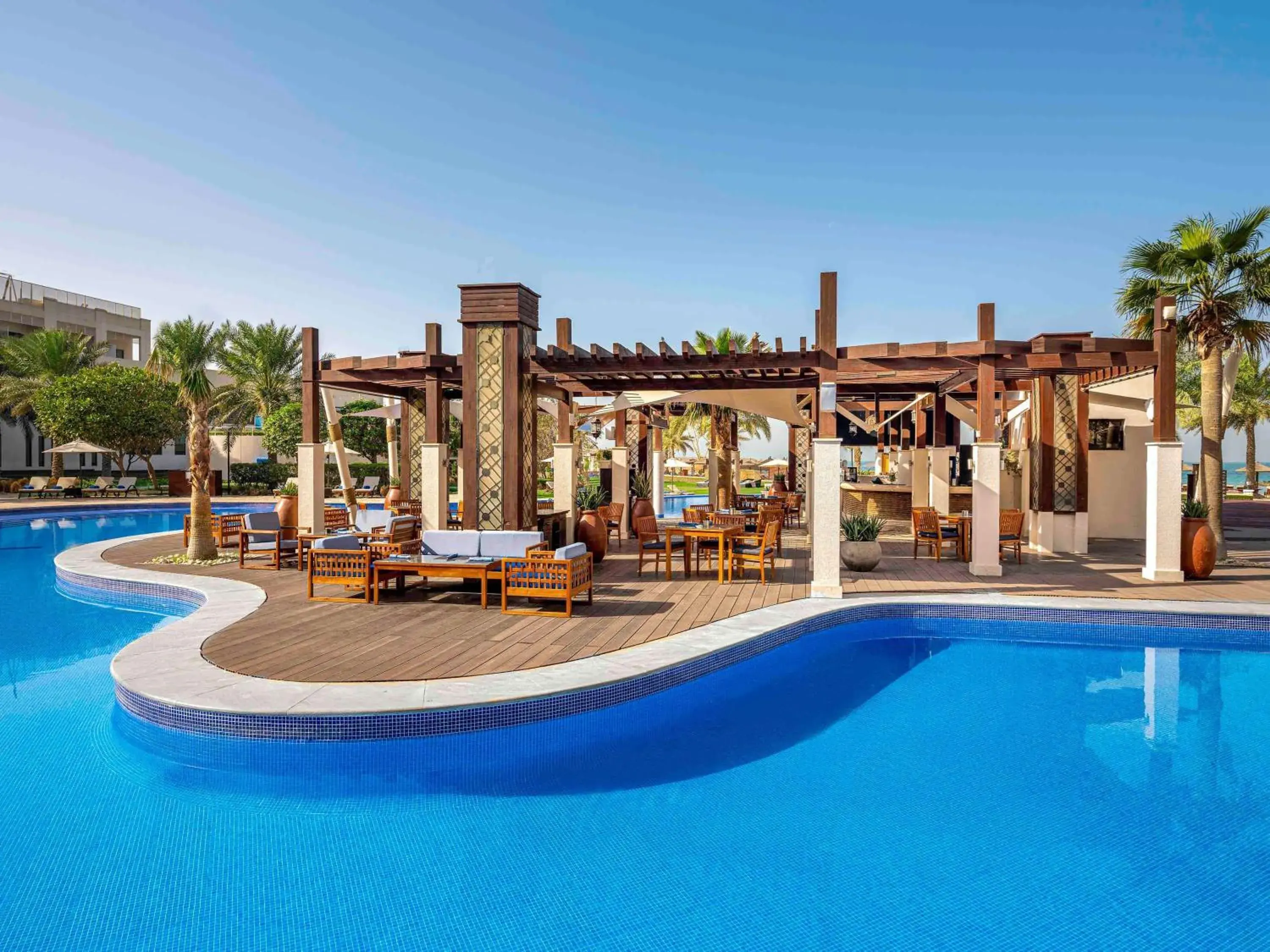 Lounge or bar, Swimming Pool in Sofitel Bahrain Zallaq Thalassa Sea & Spa