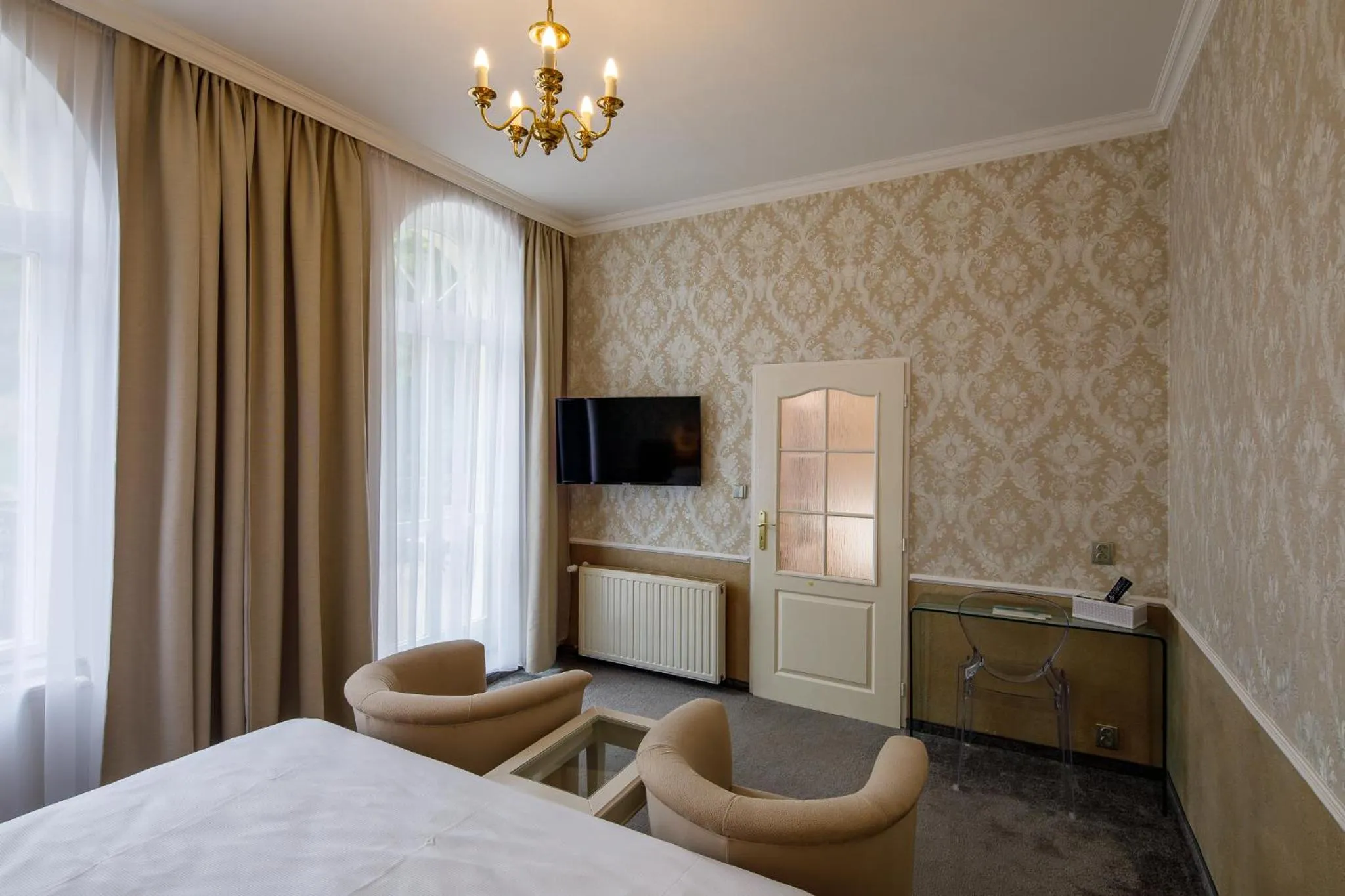 Seating area, Bed in Villa Basileia Riverside