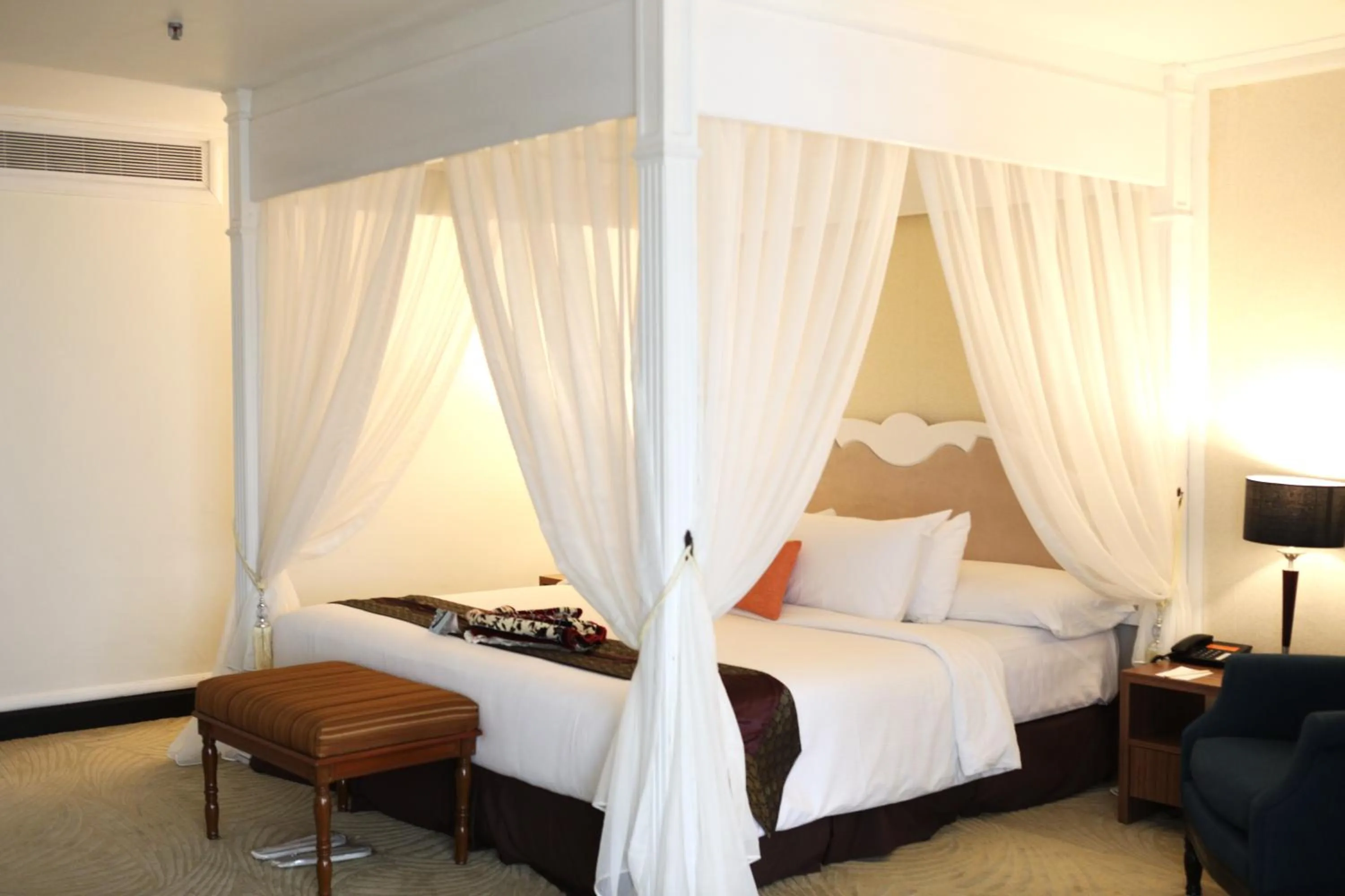 Bed in Primula Beach Hotel