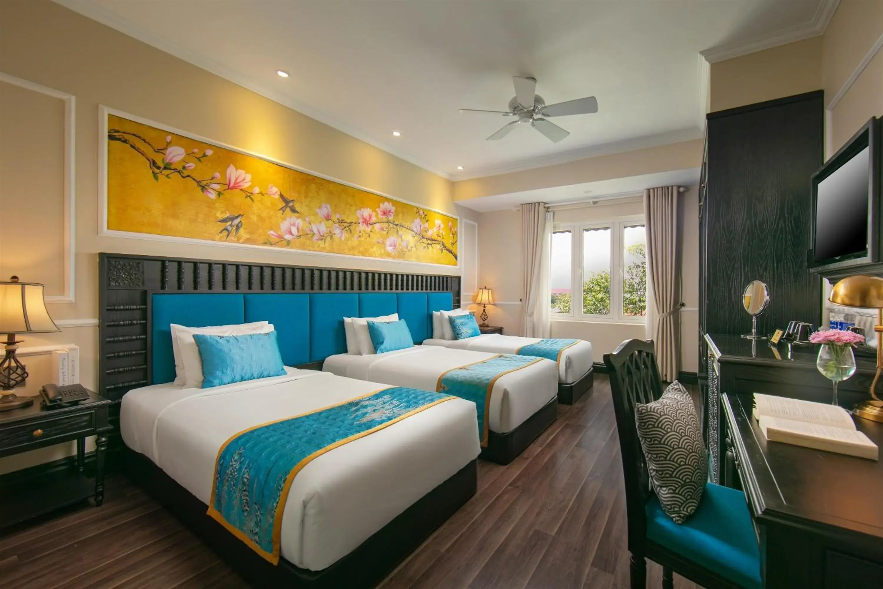 Deluxe Triple Room with City View in Hoi An Golden Holiday Hotel & Spa Deluxe Triple Room with City View in Hoi An Golden Holiday Hotel & Spa
