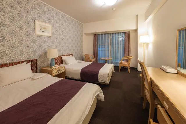 Photo of the whole room, Bed in Merveille Arima