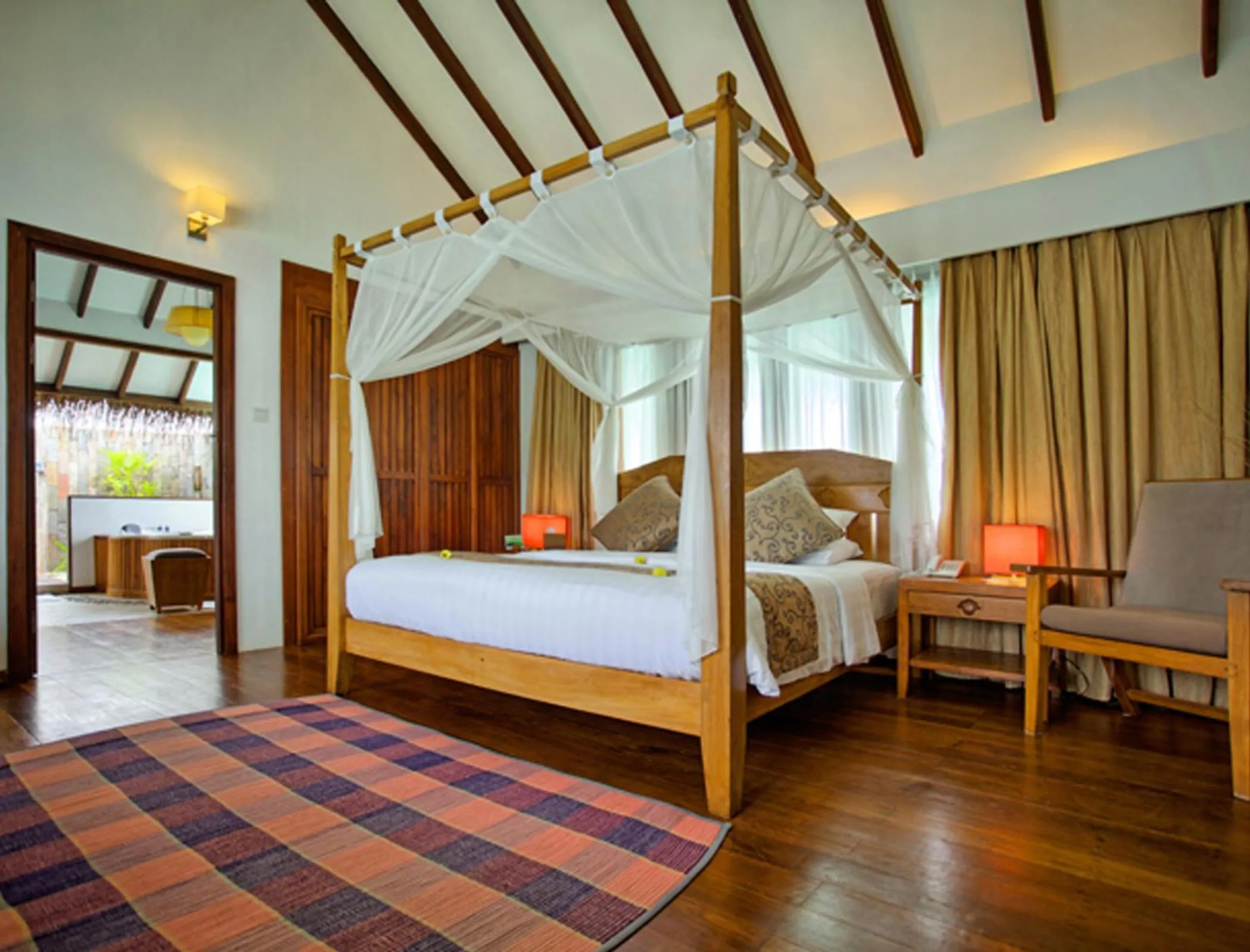 Photo of the whole room, Bed in Medhufushi Island Resort