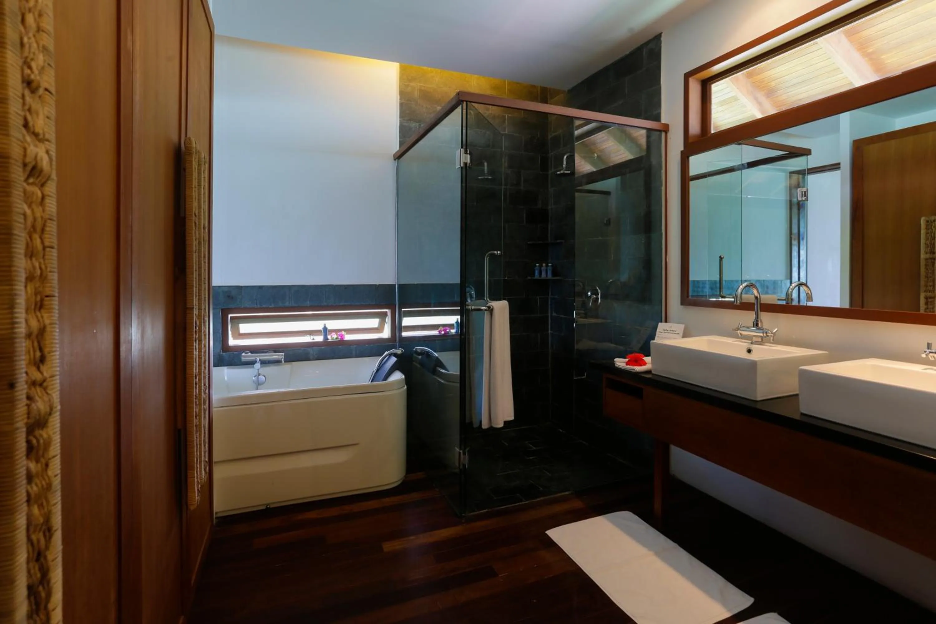 Bathroom, Bed in Medhufushi Island Resort