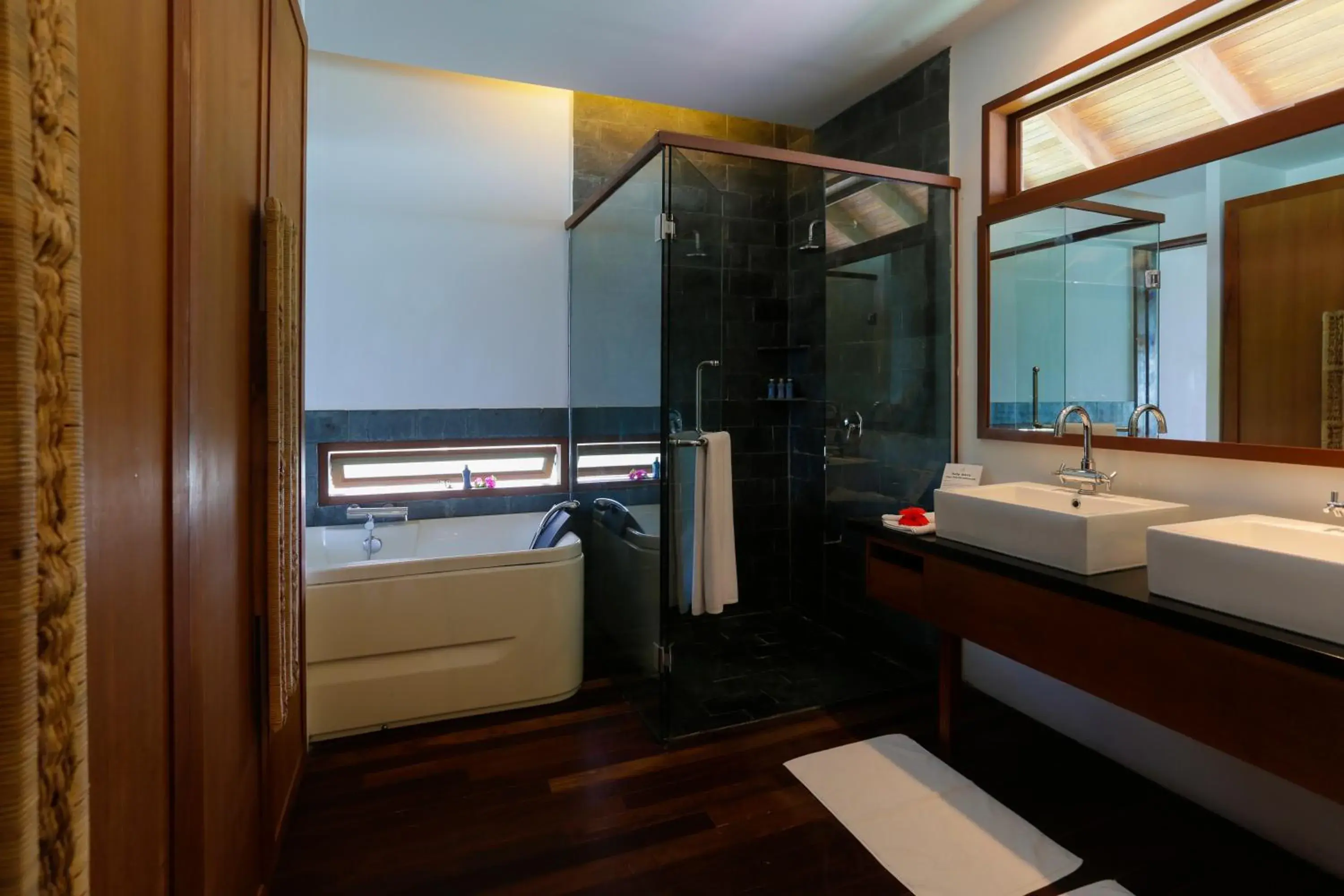 Bathroom, Bed in Medhufushi Island Resort Bathroom, Bed in Medhufushi Island Resort