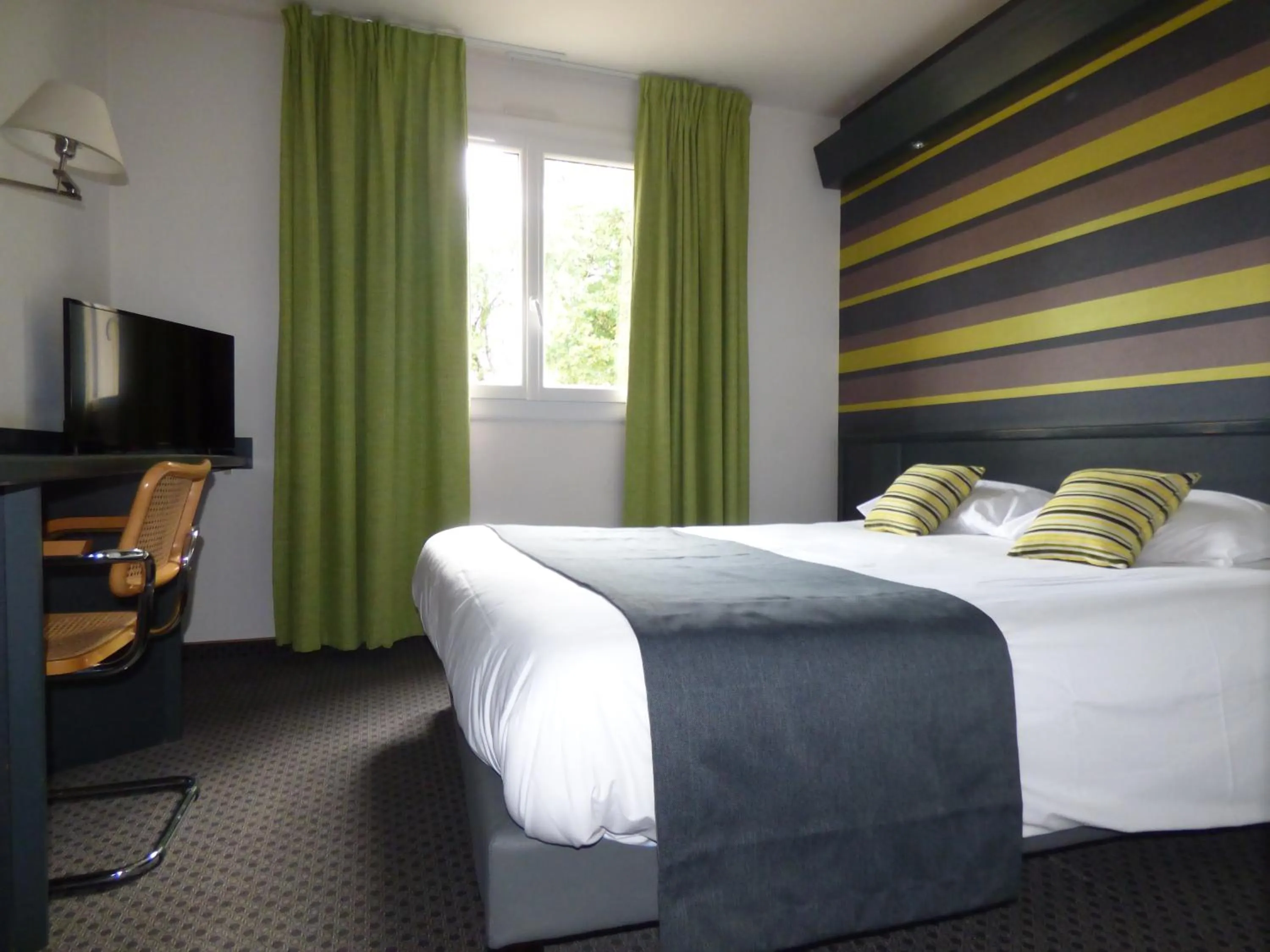 Bed in inspiration by balladins Villefranche-de-Rouergue