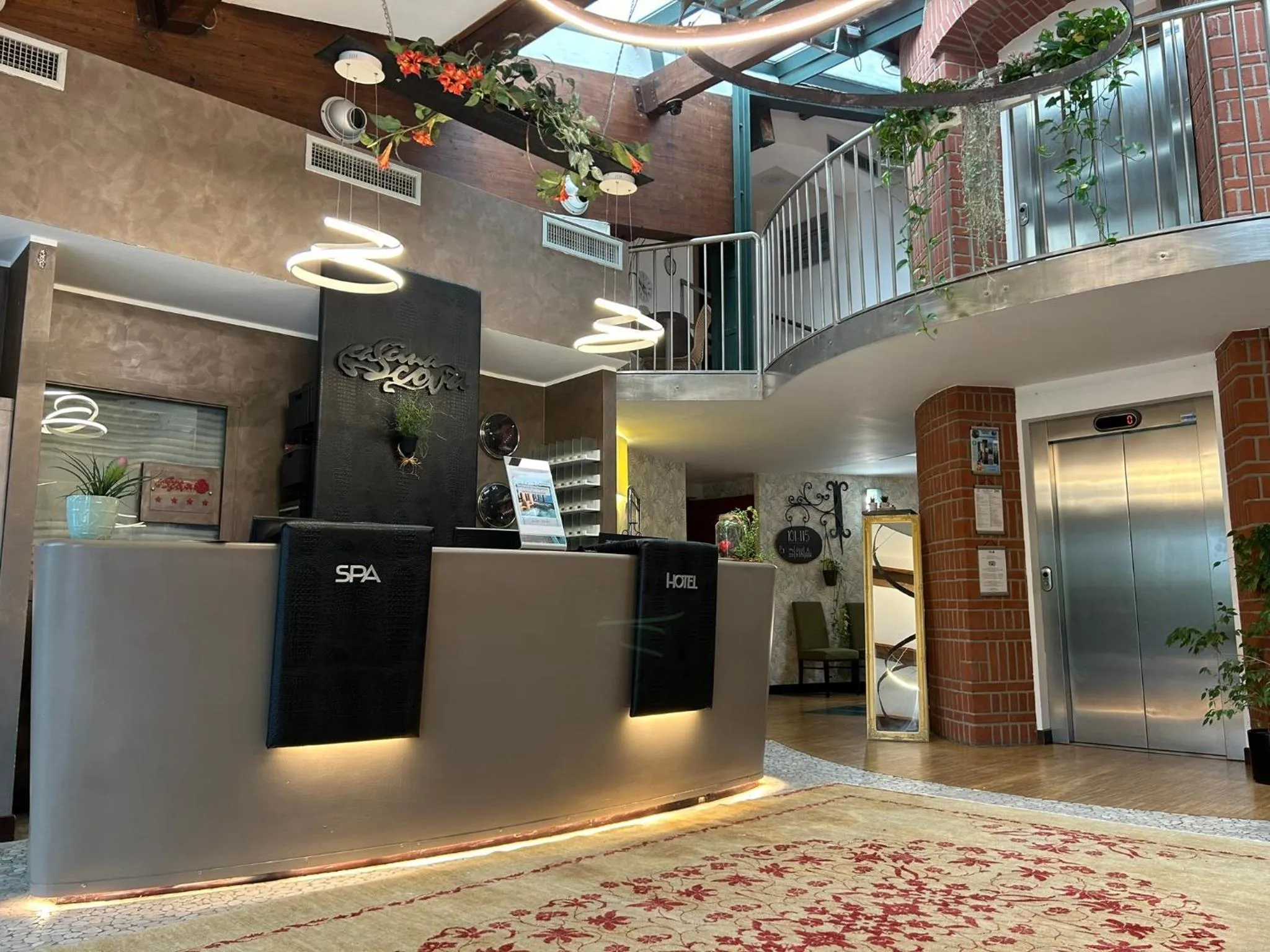 Lobby or reception in Cascina Scova Resort