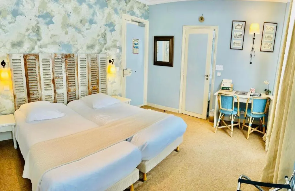Bedroom, Bed in Hotel & Restaurant LE CENTRAL TROUVILLE