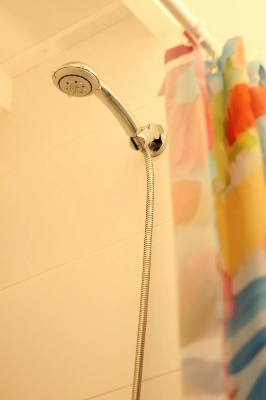 Shower in Barrio Boutik Hostal long stays