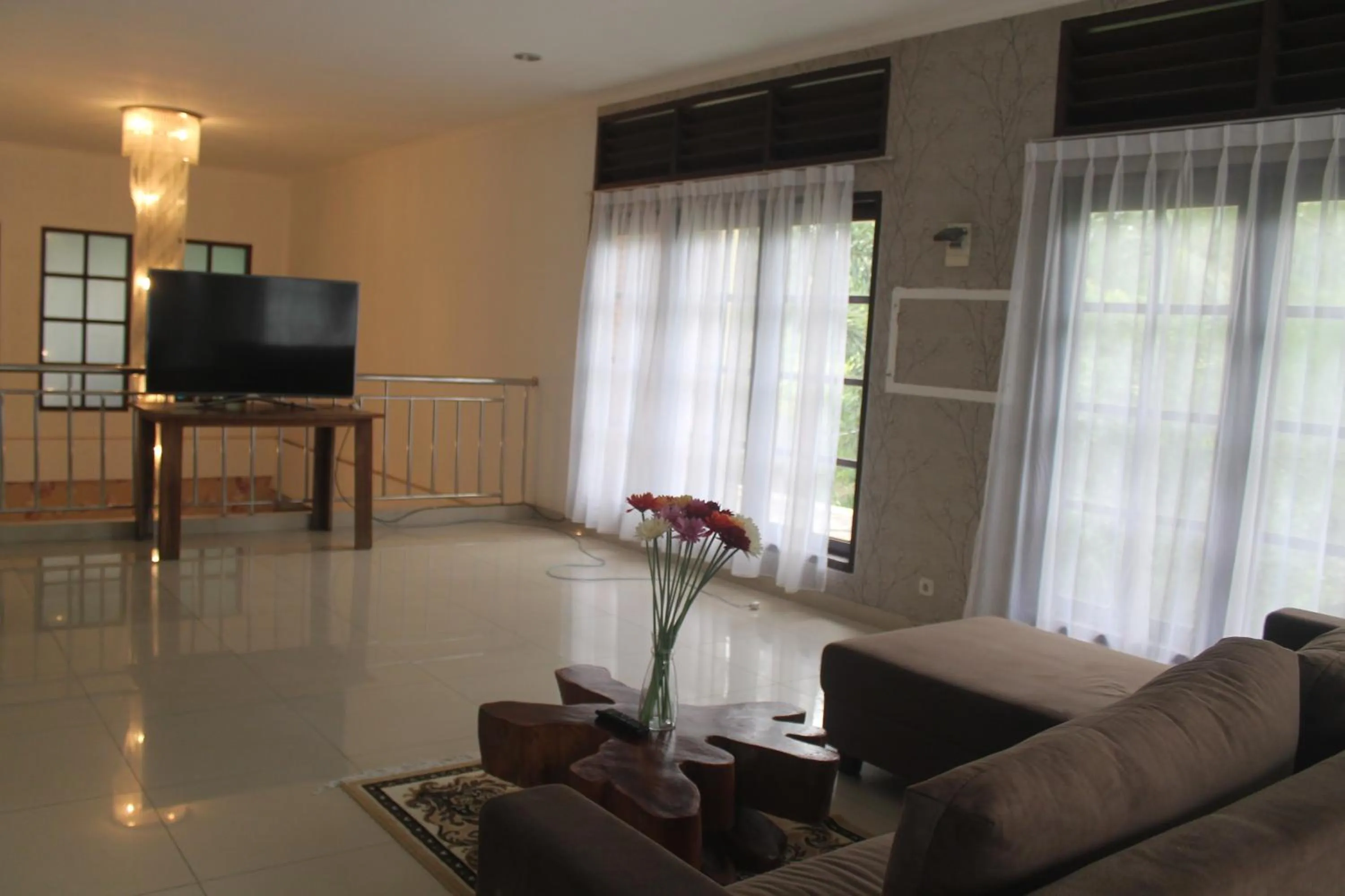 Living room in New Green Sentul Resort