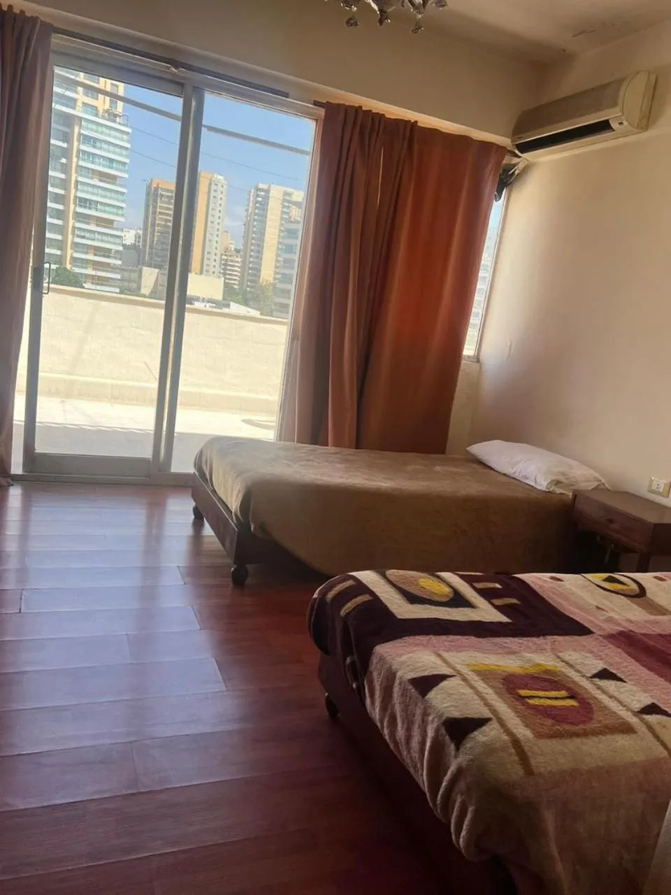 Photo of the whole room, Bed in Rawche Universal Apartments
