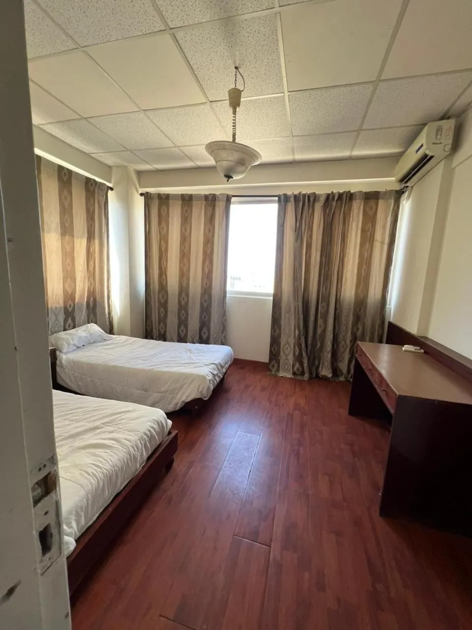 Photo of the whole room, Bed in Rawche Universal Apartments