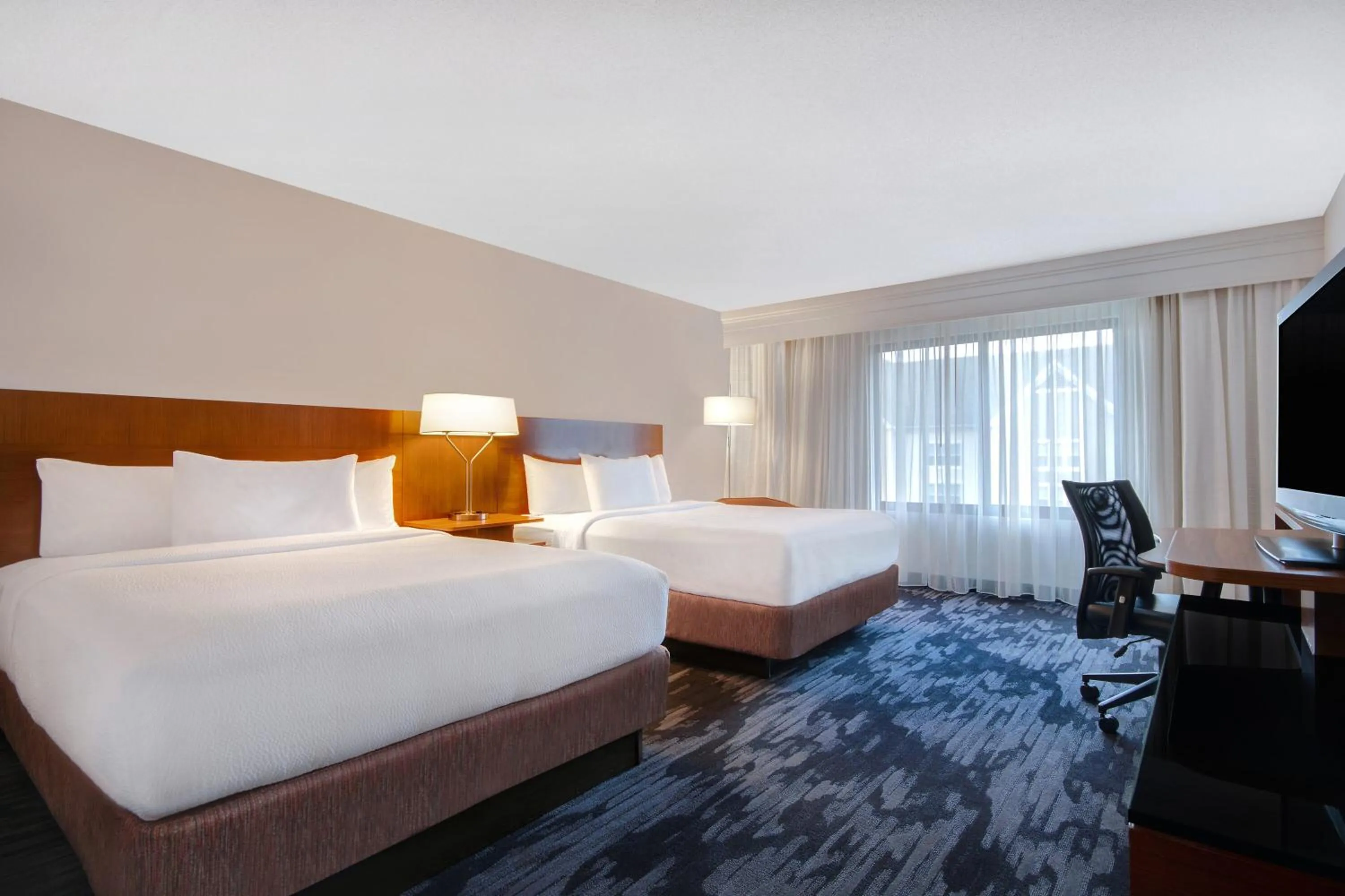 Bed in Fairfield Inn and Suites by Marriott Rochester West/Greece