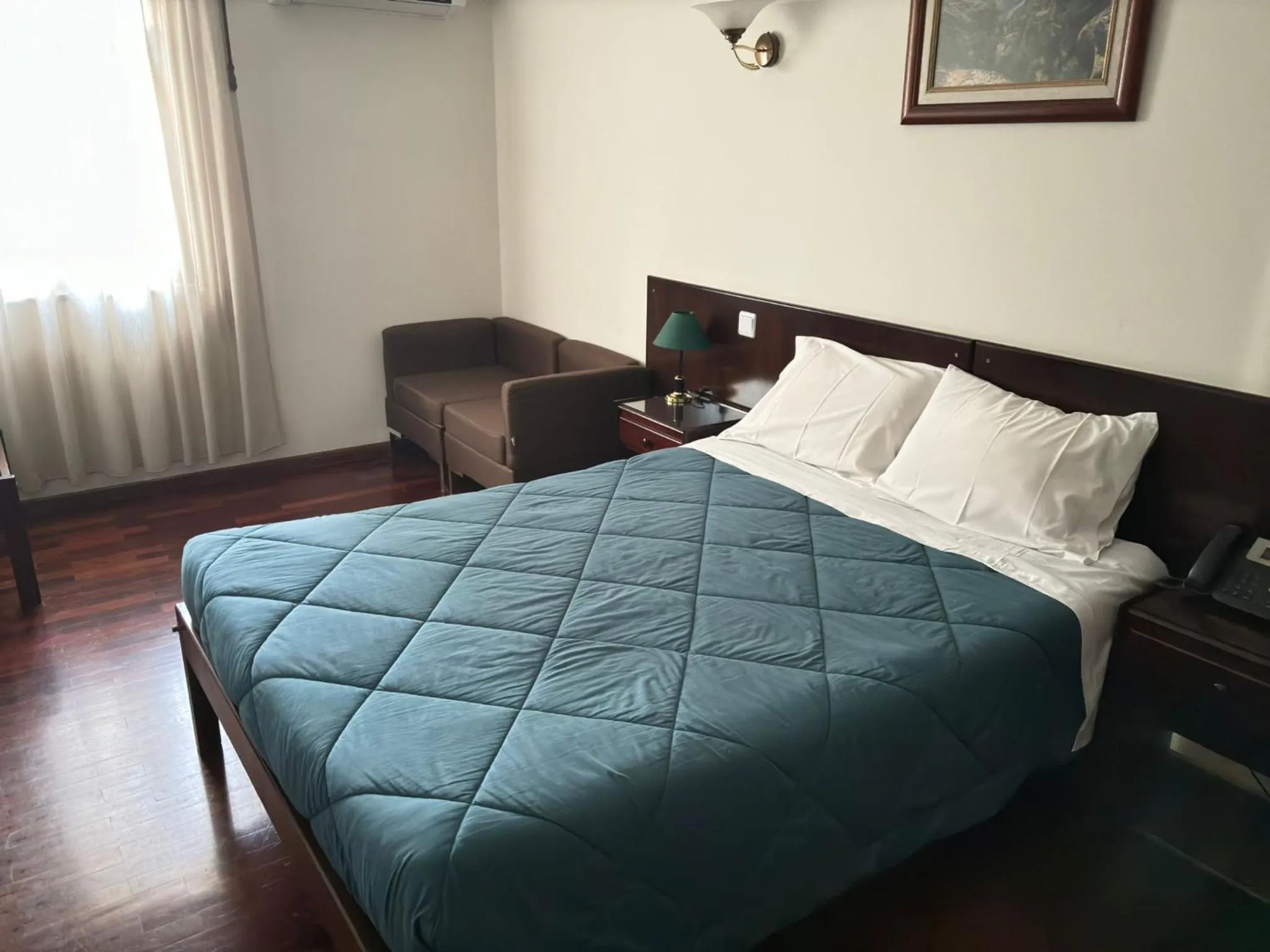 Bed in Hotel Trindade Coelho