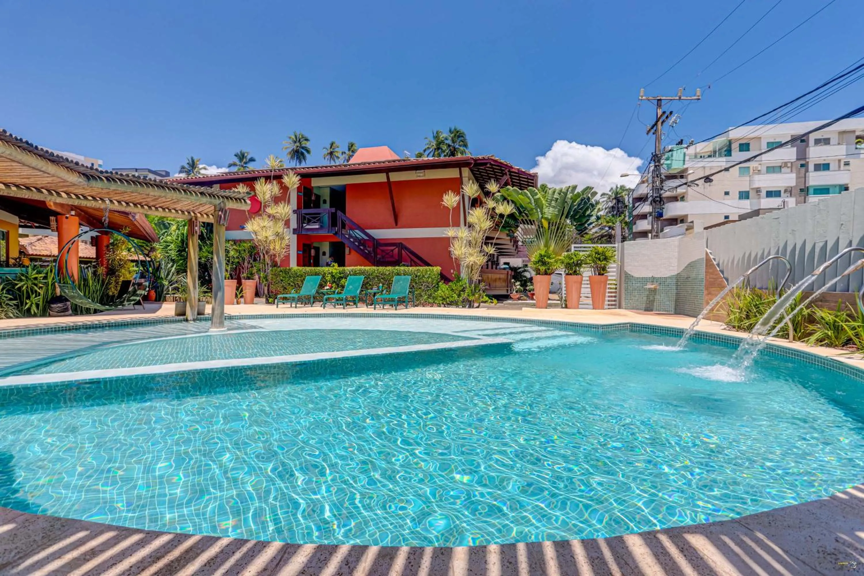 Swimming pool in Pousada Praia Bela