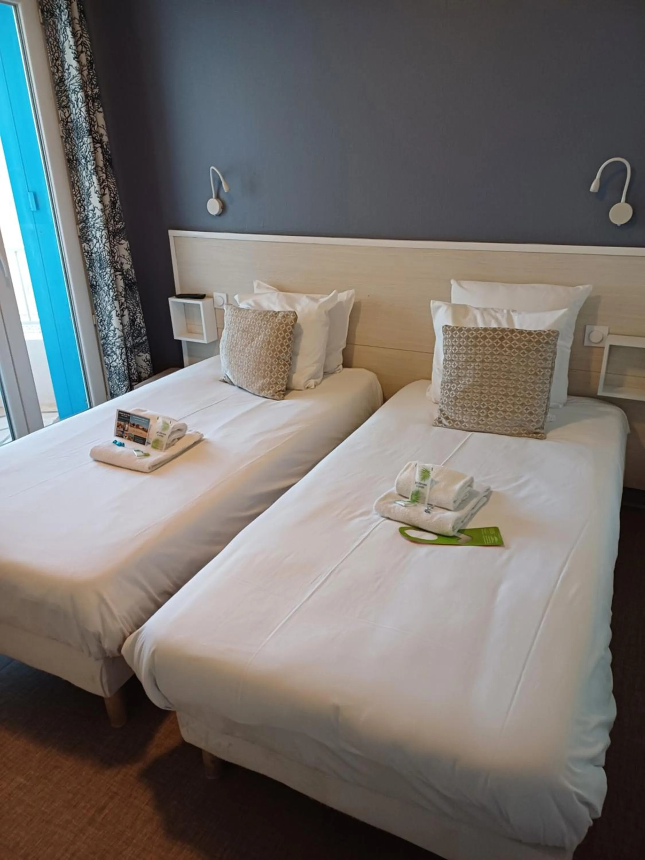 Bed in Hôtel de la Mer