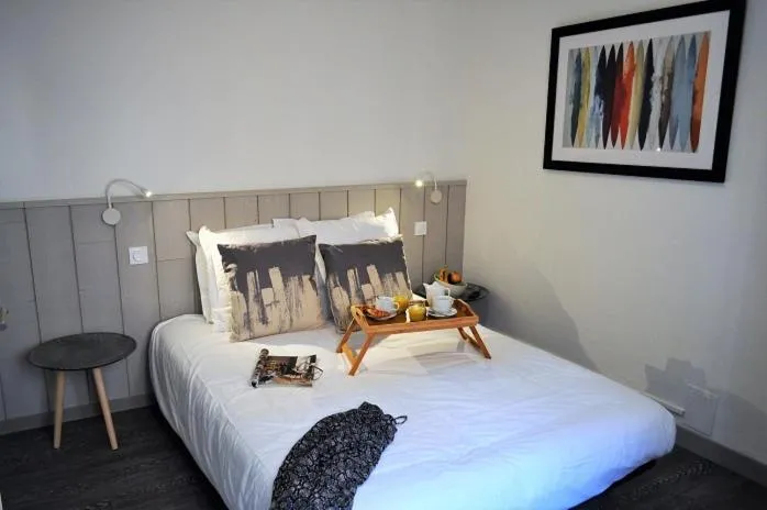 Bed in Hôtel de la Mer