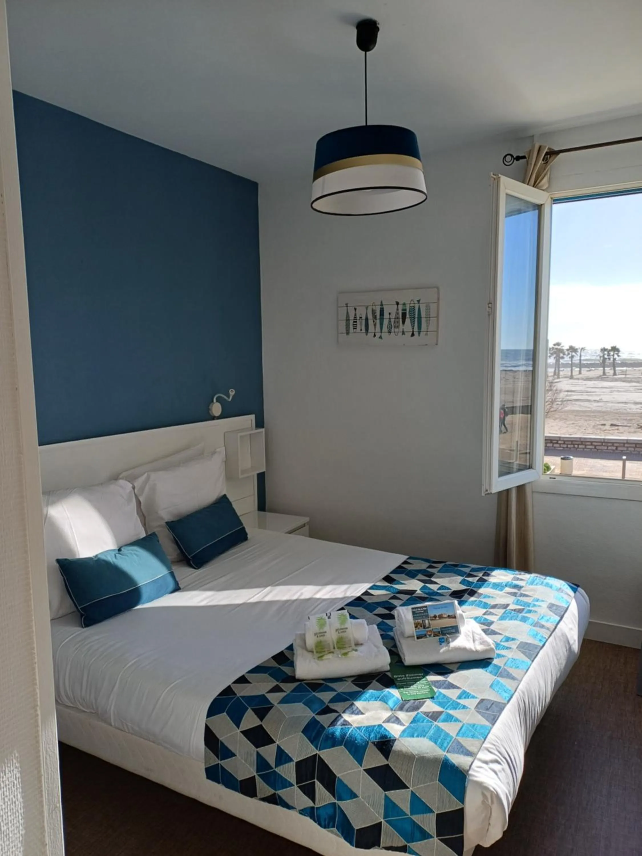 Bed in Hôtel de la Mer