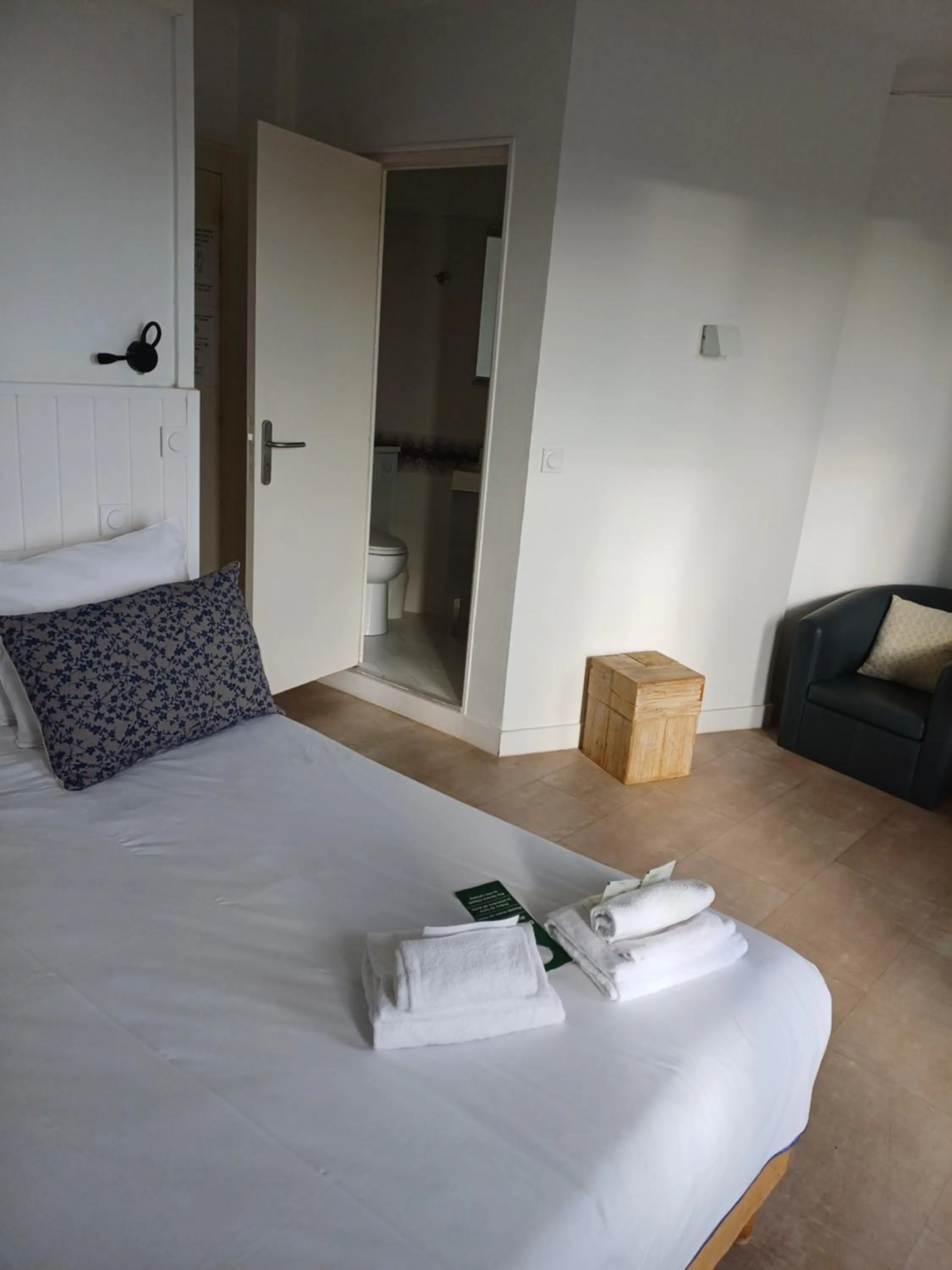 Photo of the whole room, Bed in Hôtel de la Mer