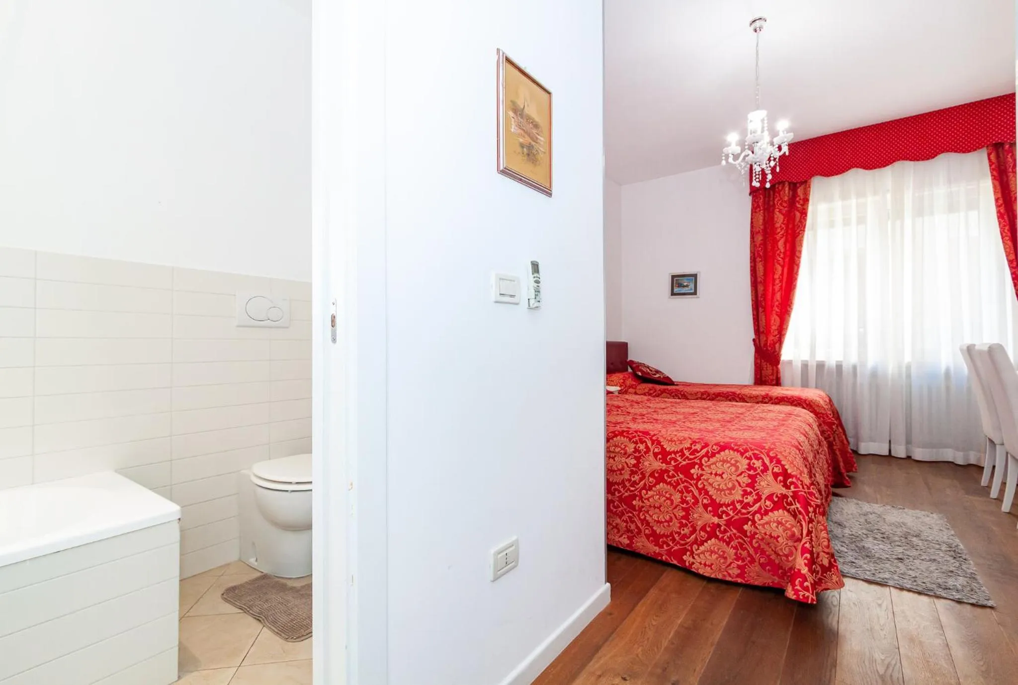 Photo of the whole room, Bed in Ca' Rebeka Venice - Atika & Atif