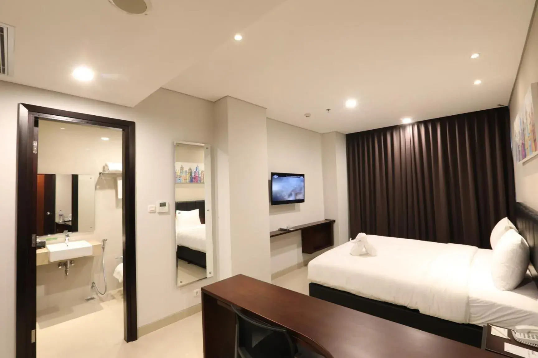 Bedroom, Bed in PrimeBiz Hotel Surabaya Bedroom, Bed in PrimeBiz Hotel Surabaya