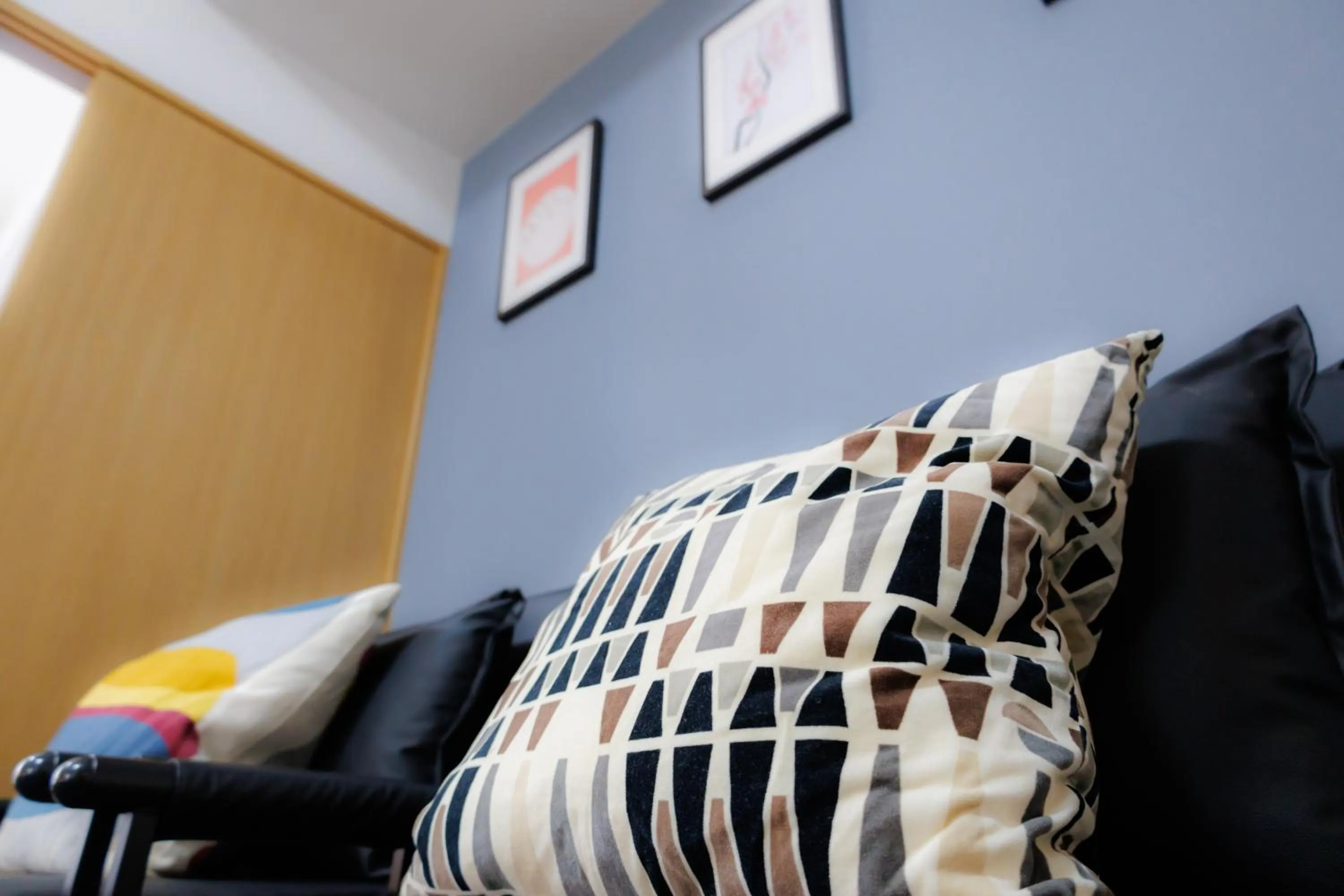 Bed in Grande Famille Shimanouchi Dotonbori Condo