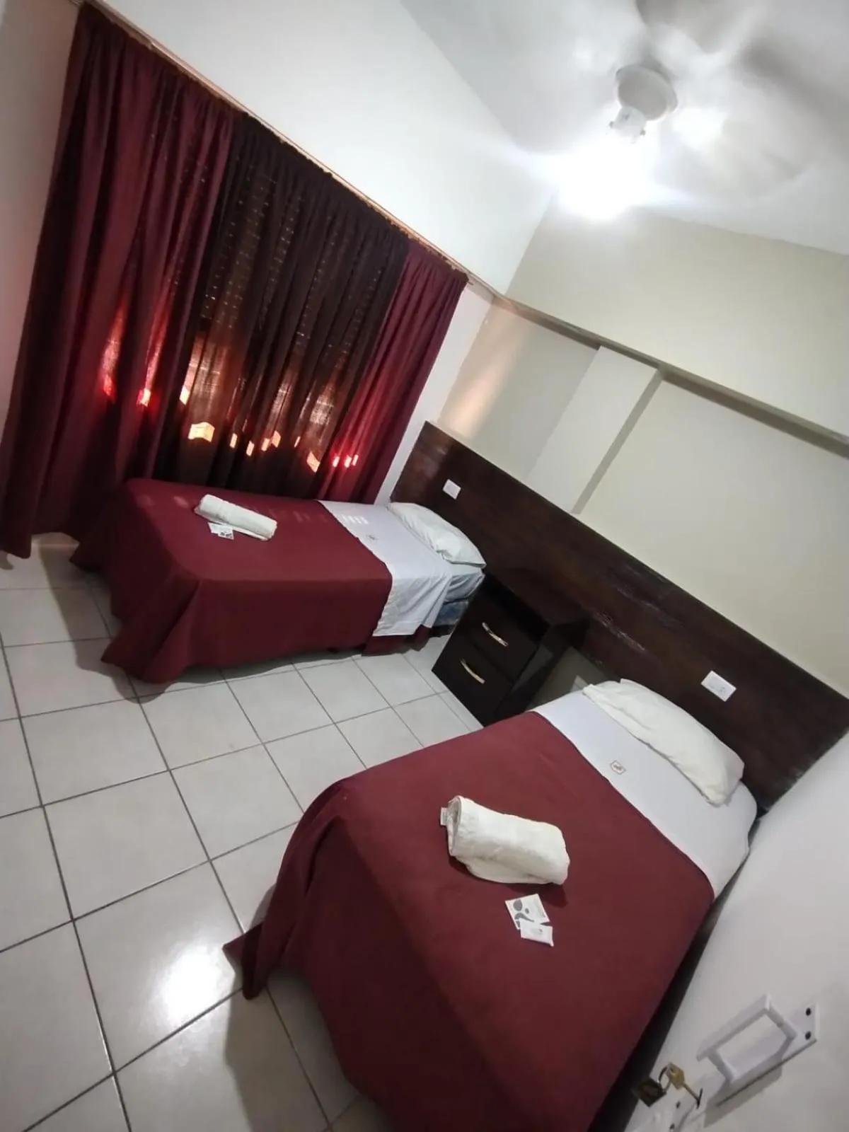 Bed in San Remo Resort Hotel