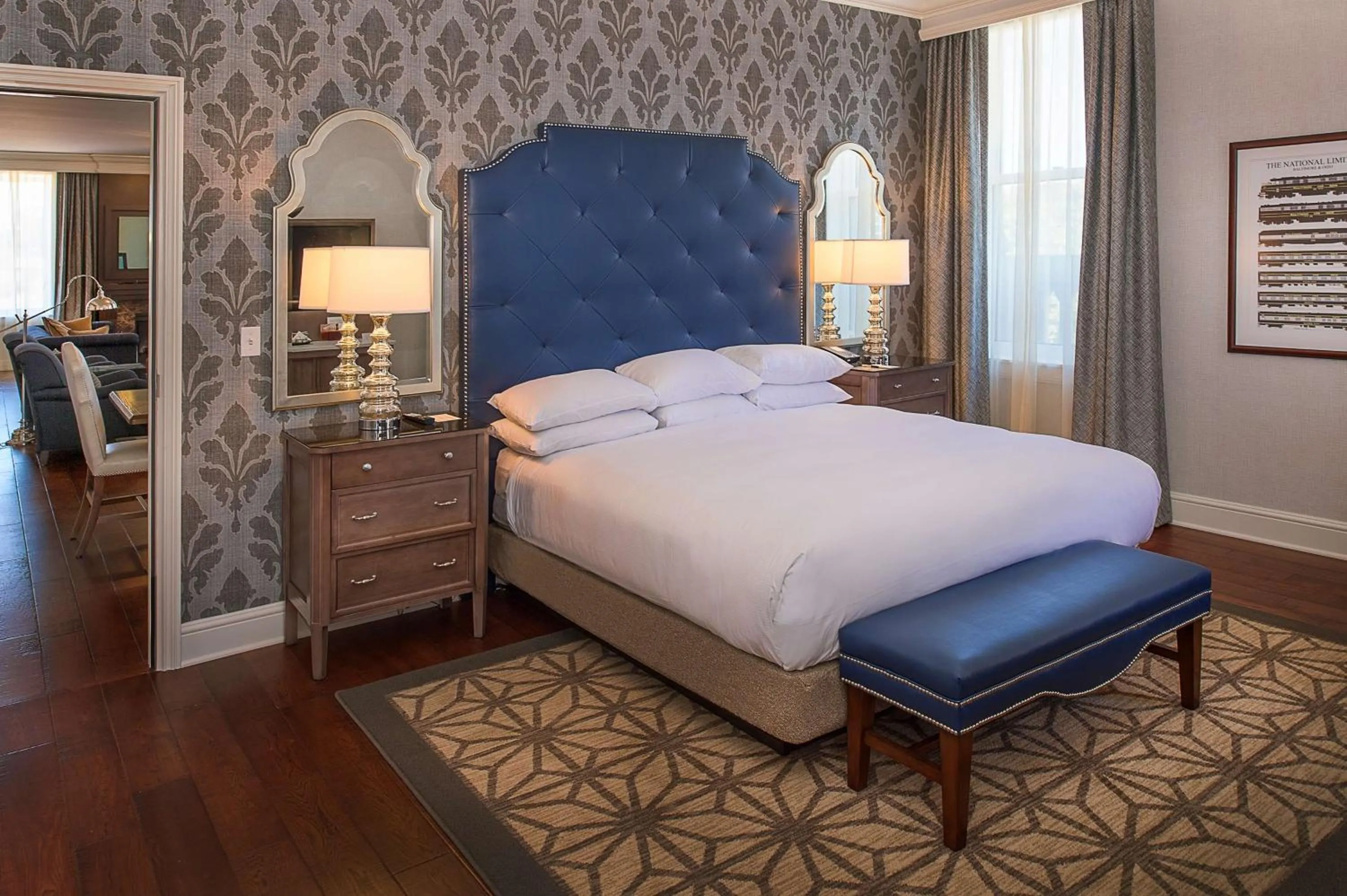 Living room, Bed in St. Louis Union Station Hotel, Curio Collection by Hilton