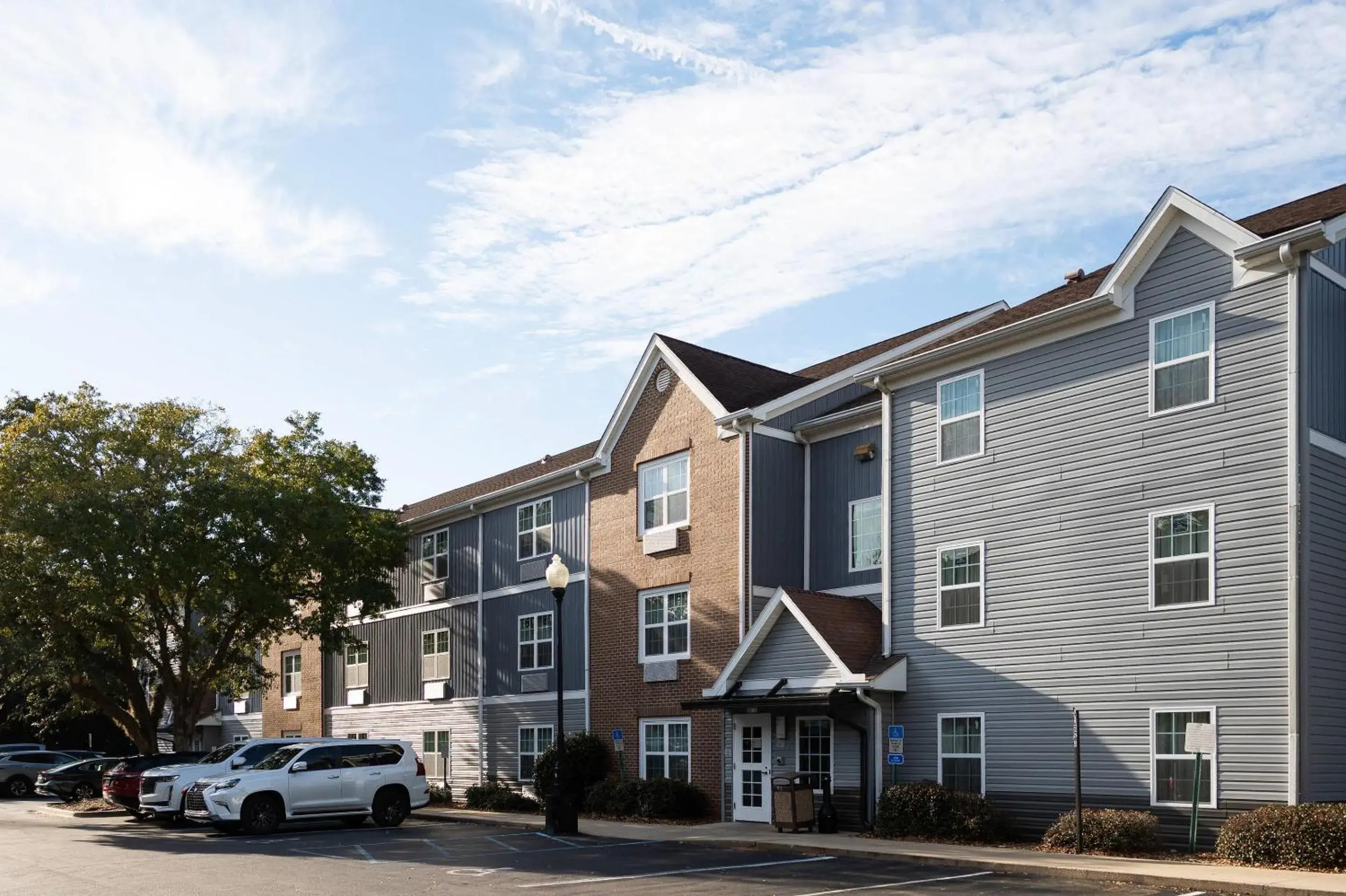 Property building in Alluxsuites at 1876, an Ascend Collection Hotel Property building in Alluxsuites at 1876, an Ascend Collection Hotel