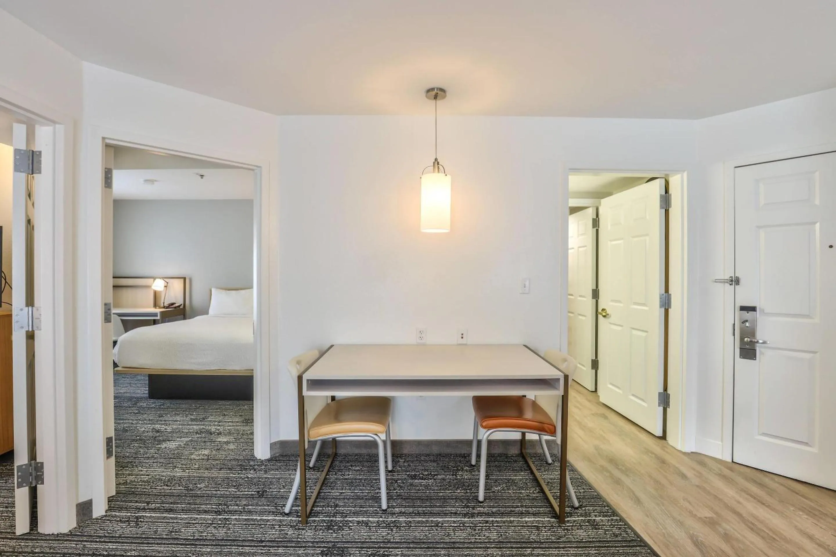 Bedroom in Alluxsuites at 1876, an Ascend Collection Hotel