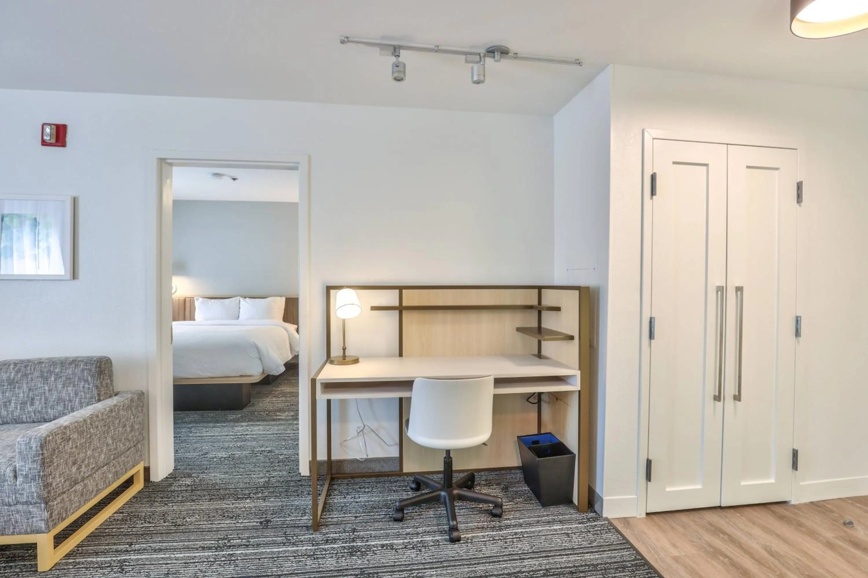 Bedroom in Alluxsuites at 1876, an Ascend Collection Hotel