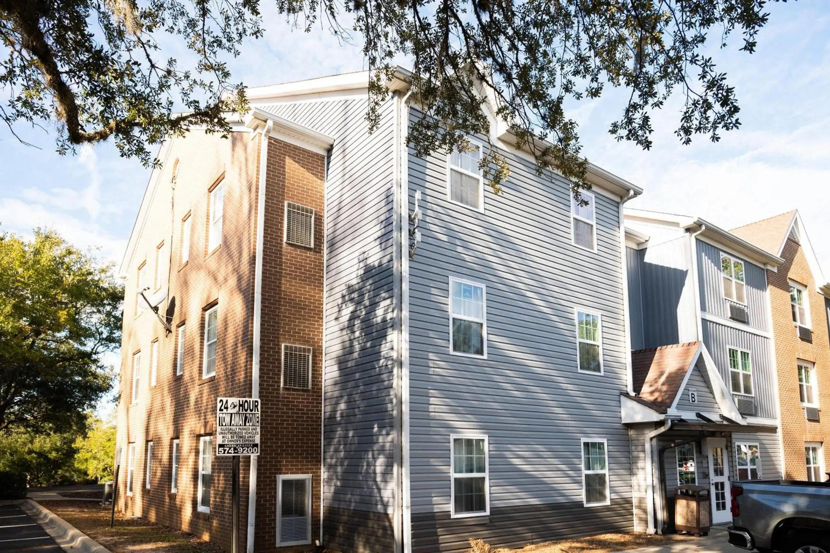 Property building in Alluxsuites at 1876, an Ascend Collection Hotel Property building in Alluxsuites at 1876, an Ascend Collection Hotel