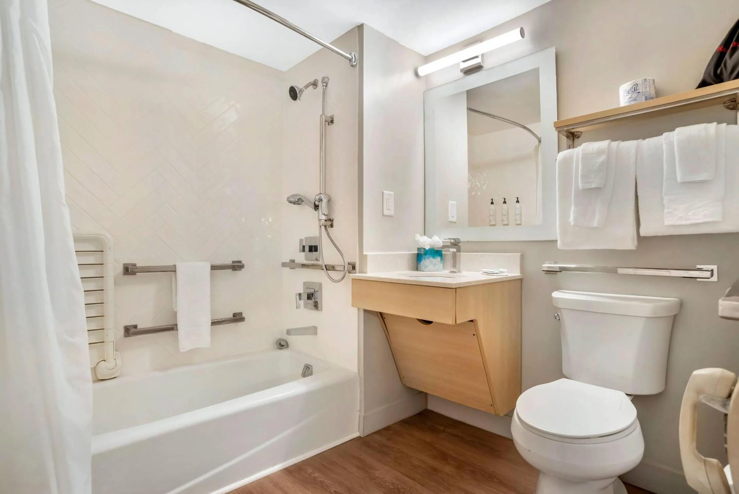 Bedroom in Alluxsuites at 1876, an Ascend Collection Hotel