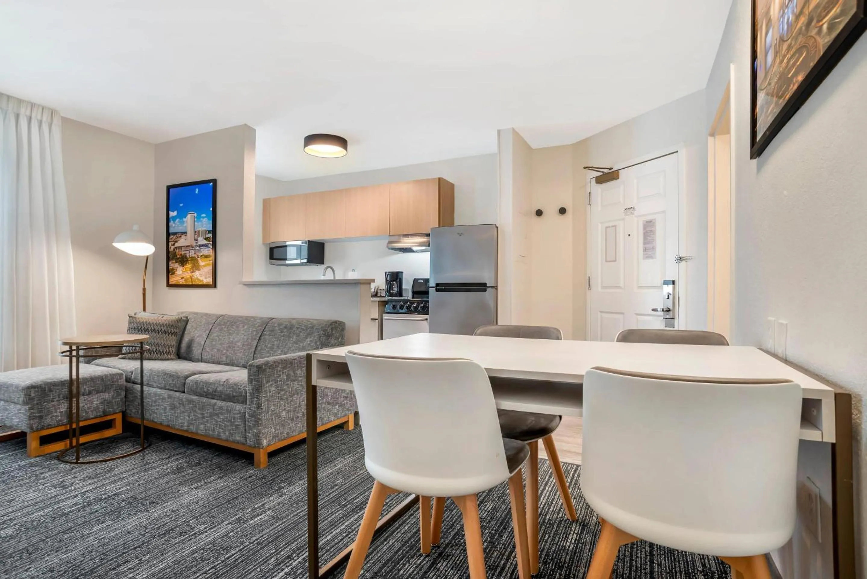 Bedroom in Alluxsuites at 1876, an Ascend Collection Hotel