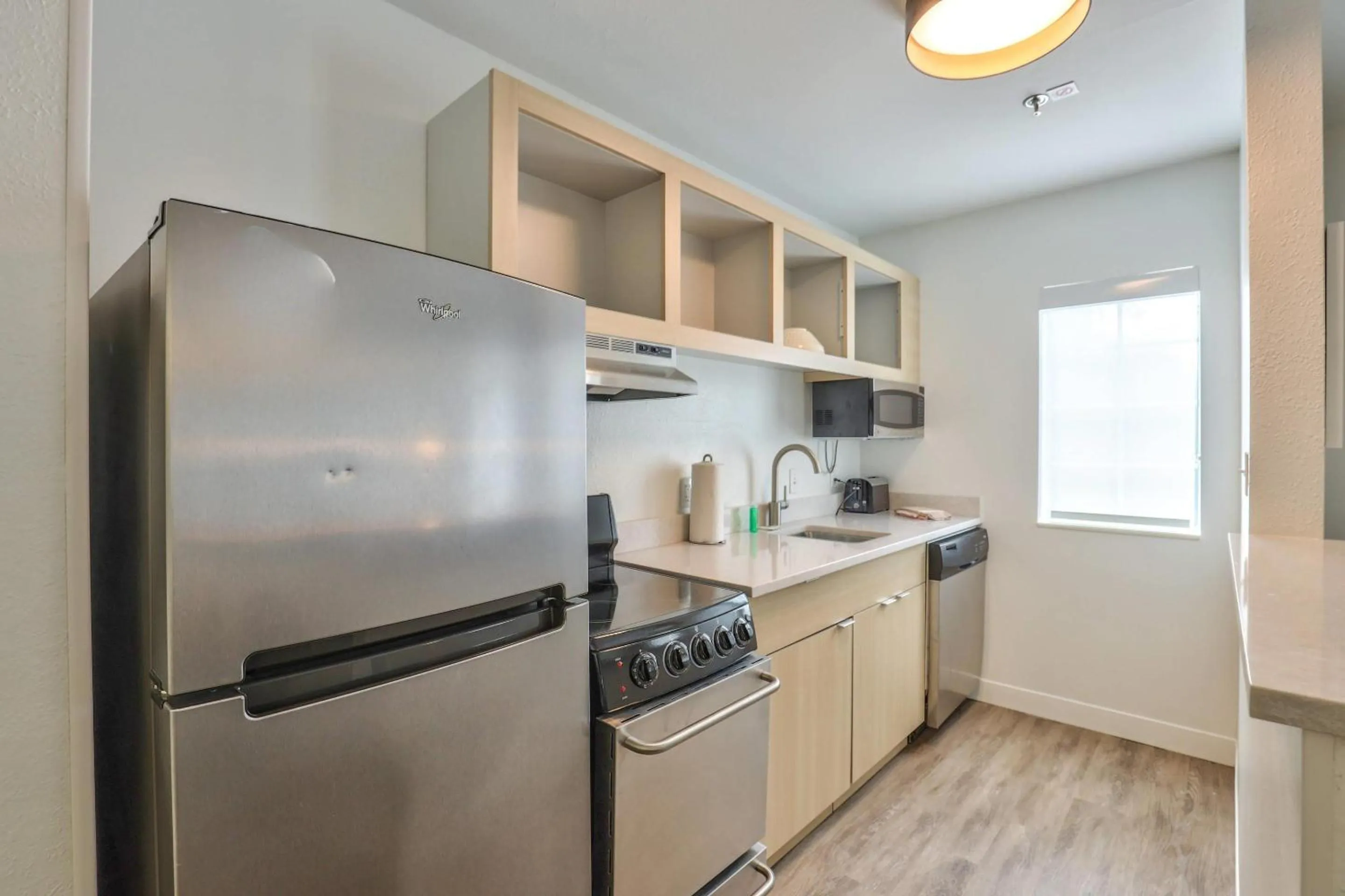 Bedroom in Alluxsuites at 1876, an Ascend Collection Hotel