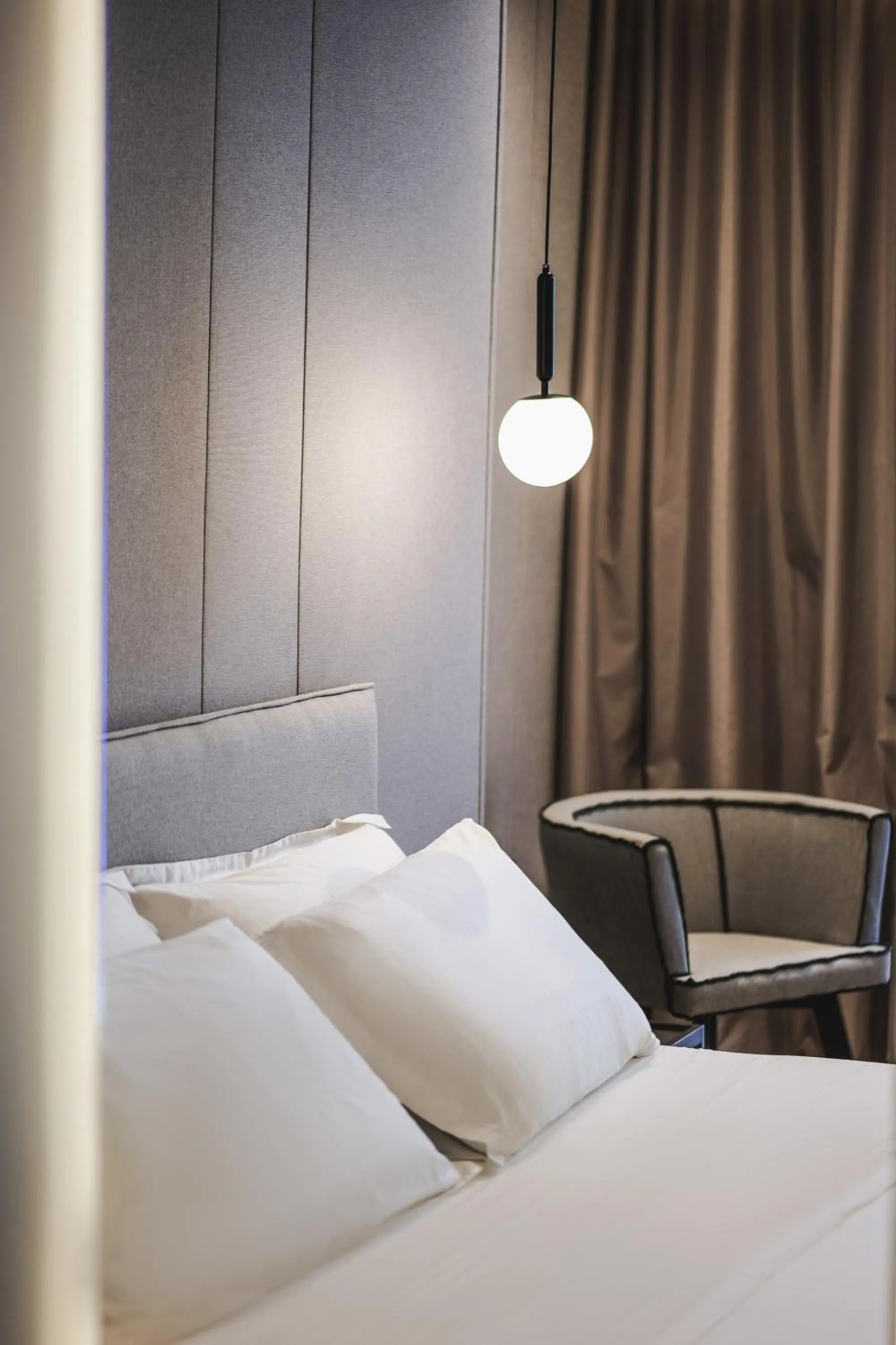 Bed in Miramare Boutique Hotel