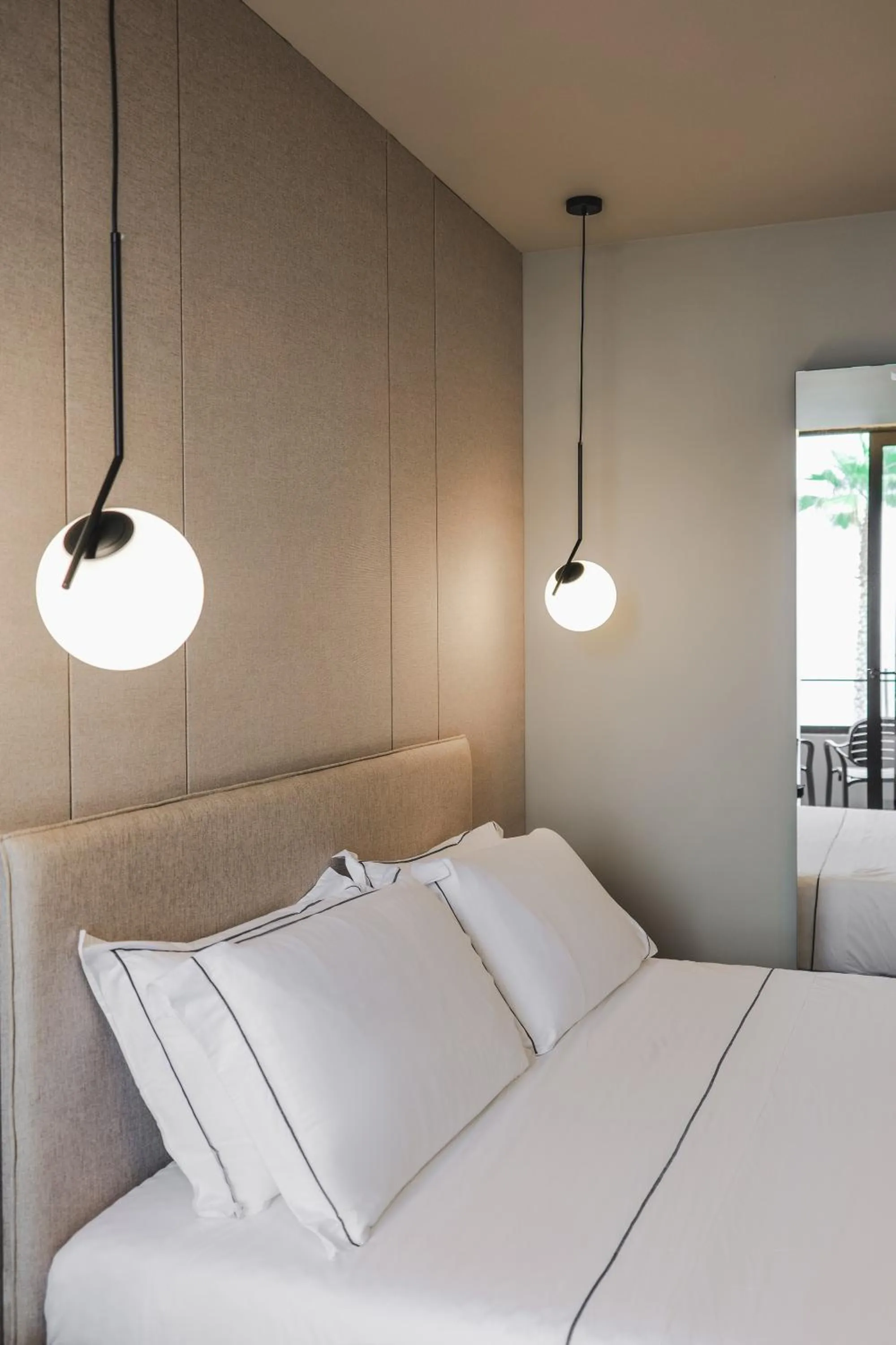 Bed in Miramare Boutique Hotel