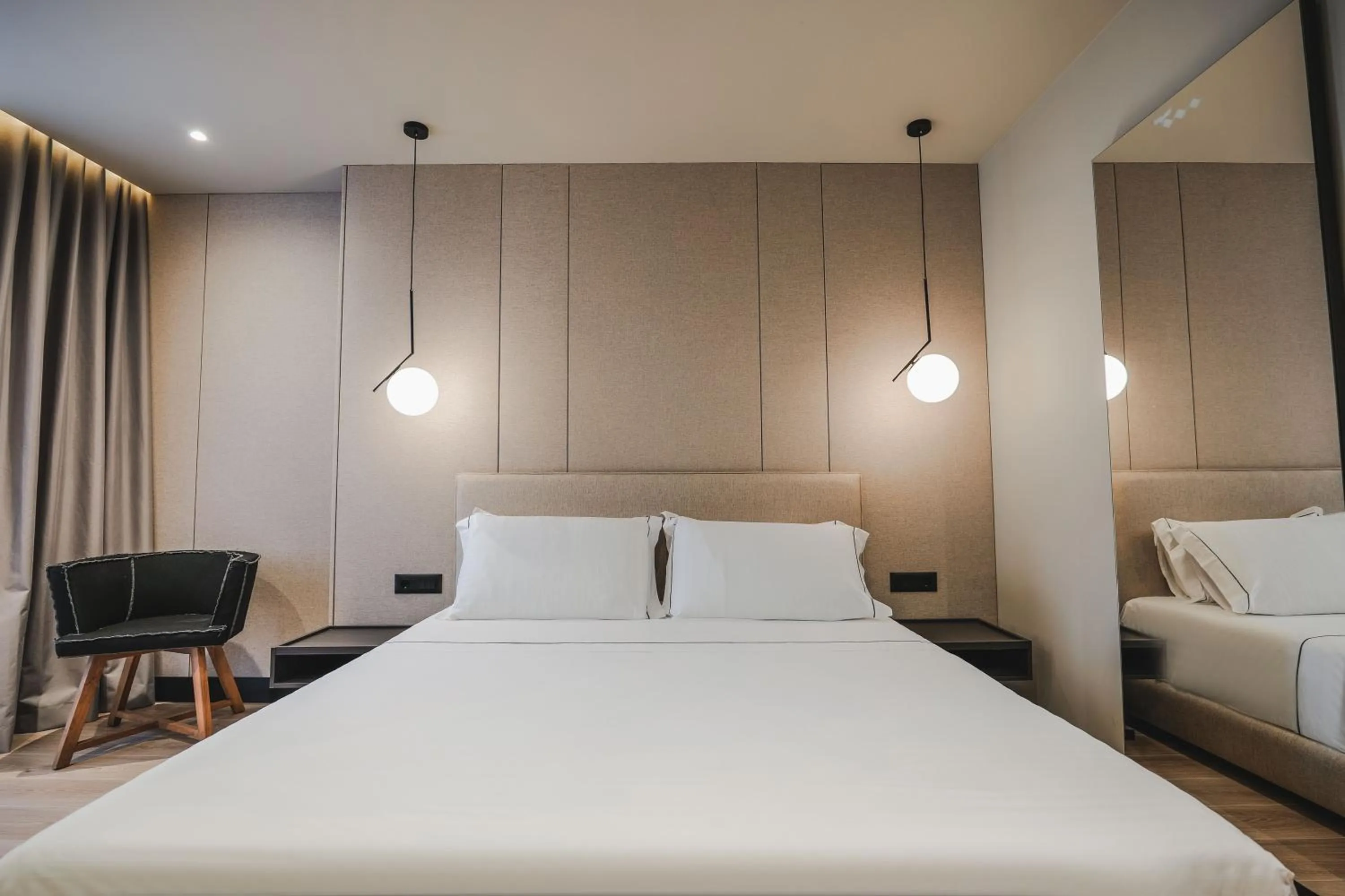 Bed in Miramare Boutique Hotel