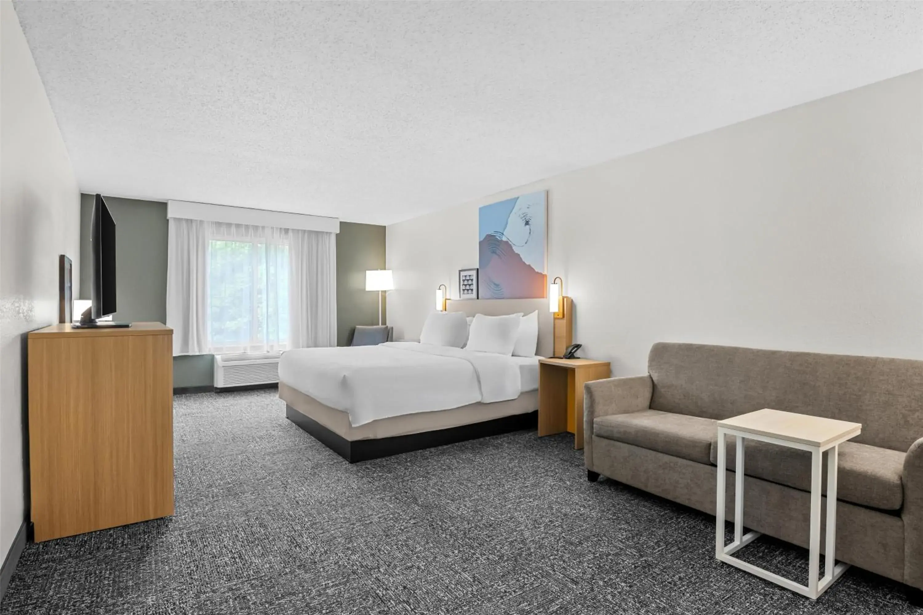 Living room, Bed in Spark By Hilton Traverse City Living room, Bed in Spark By Hilton Traverse City