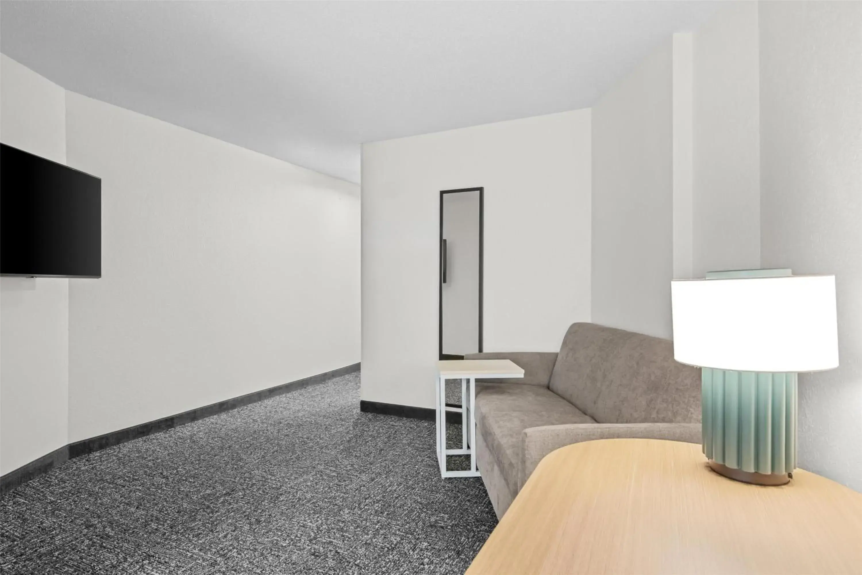 Living room in Spark By Hilton Traverse City Living room in Spark By Hilton Traverse City