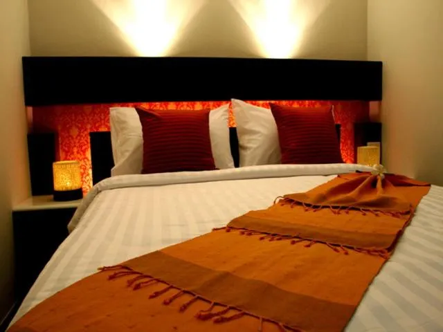 Bed in Suvarnabhumi Suite Hotel