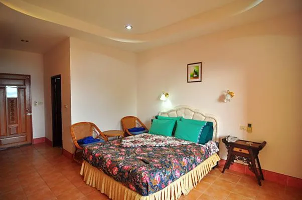 Bed in Baan Karon Hill Phuket Resort