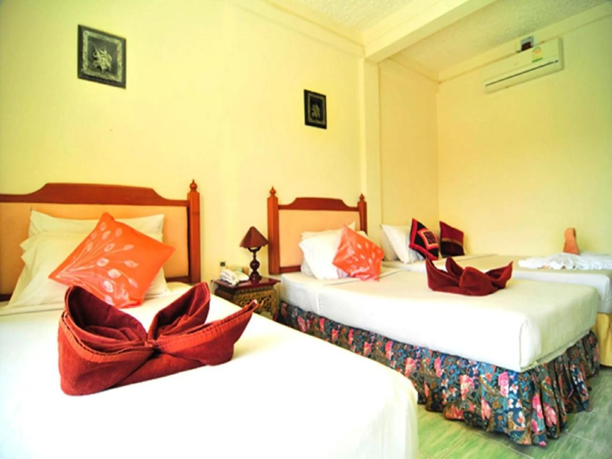 Bed in Baan Karon Hill Phuket Resort